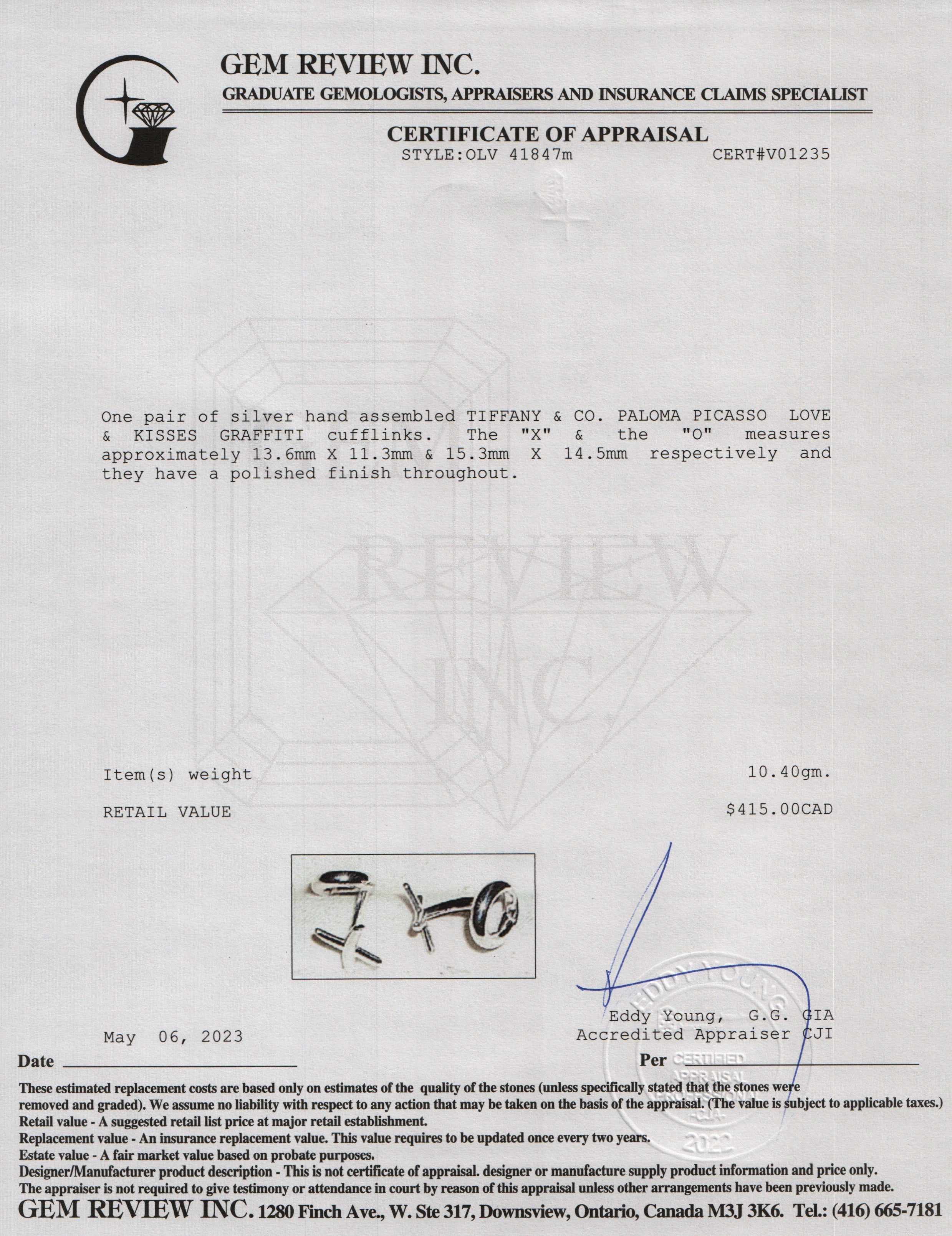 Tiffany & Co. Paloma Picasso Love & Kisses Cuff Links