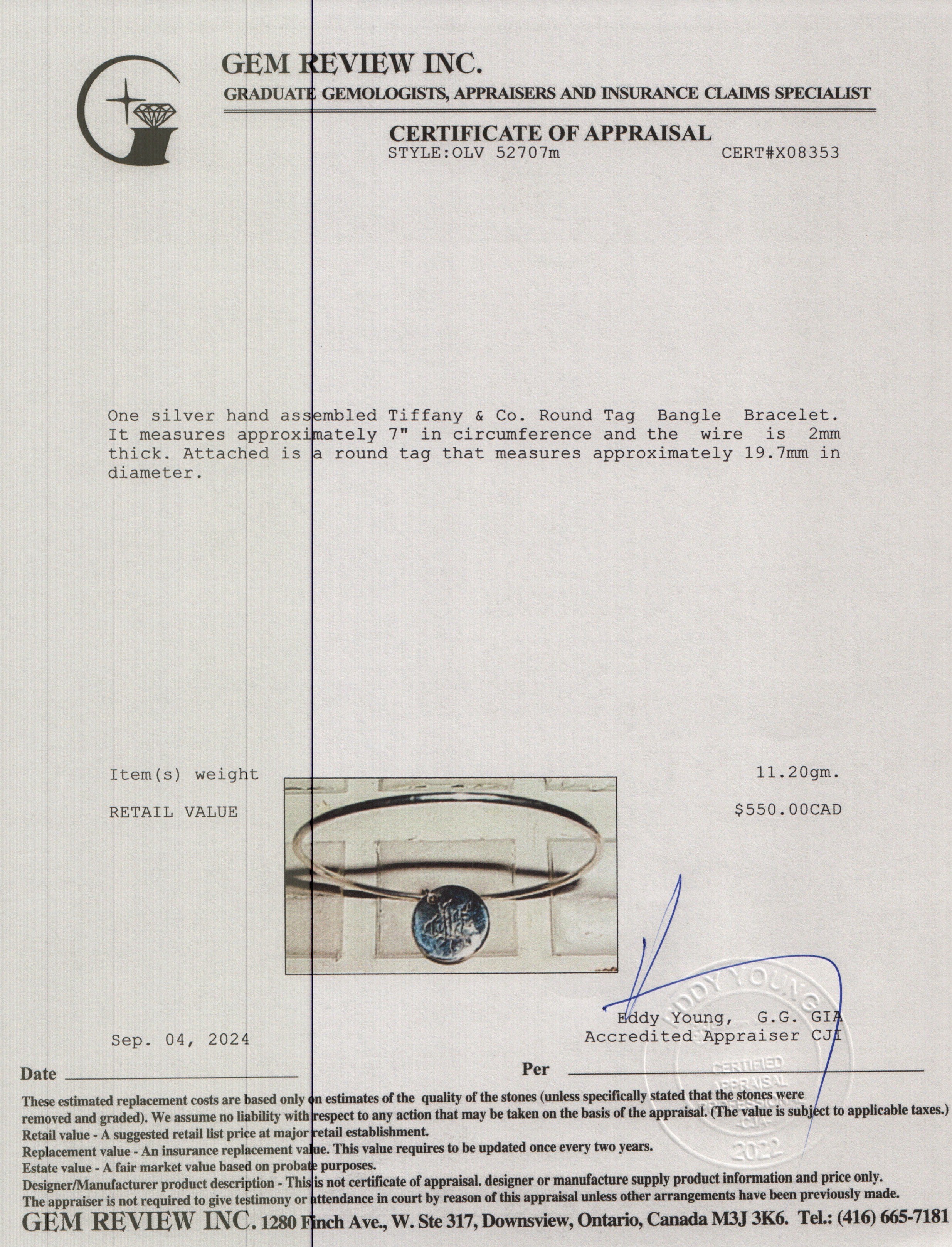 Tiffany & Co. Sterling Silver Round Tag Bangle Bracelet