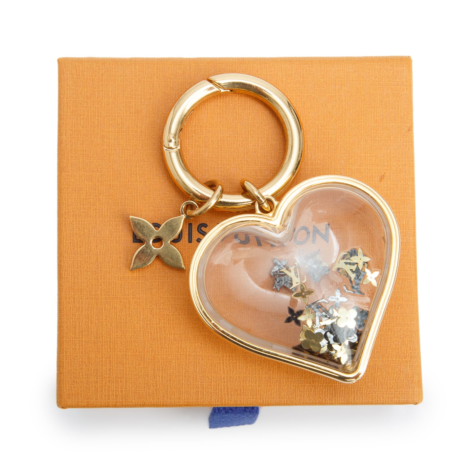 Louis Vuitton 2022 Gold-Tone Plexiglass Heart I LV U Bag Charm w/ Box