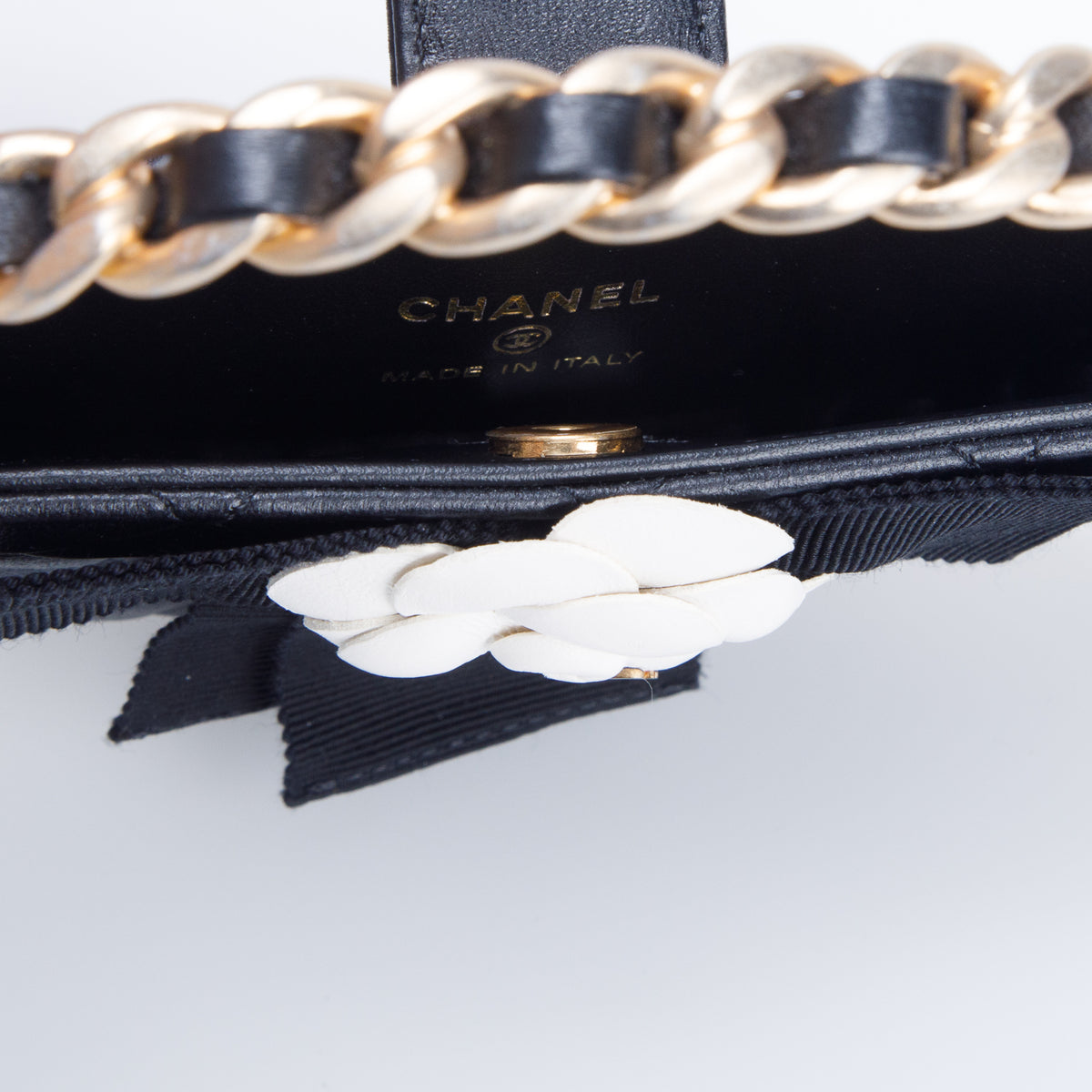 Chanel Lambskin Quilted Round Camellia Mini Clutch