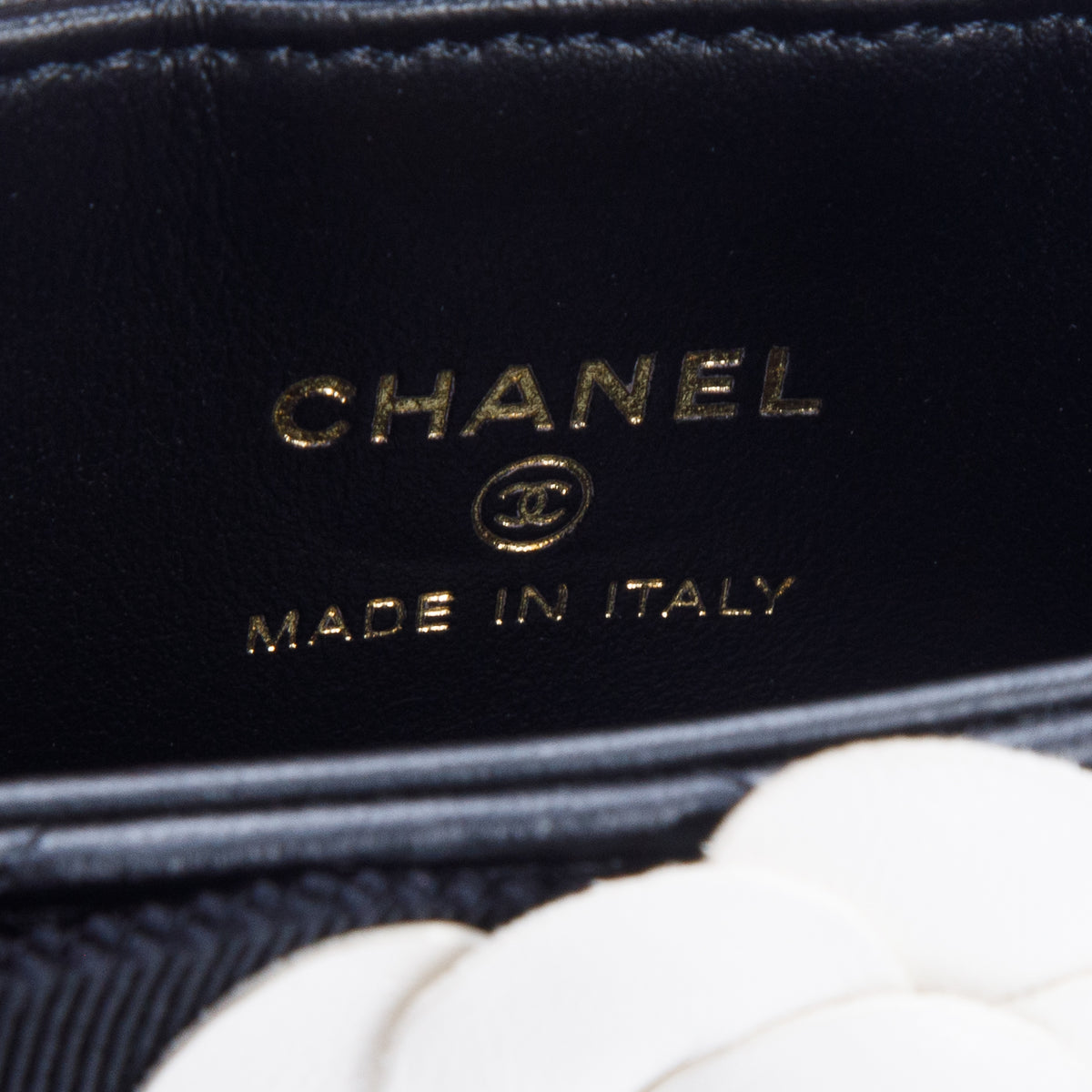 Chanel Lambskin Quilted Round Camellia Mini Clutch