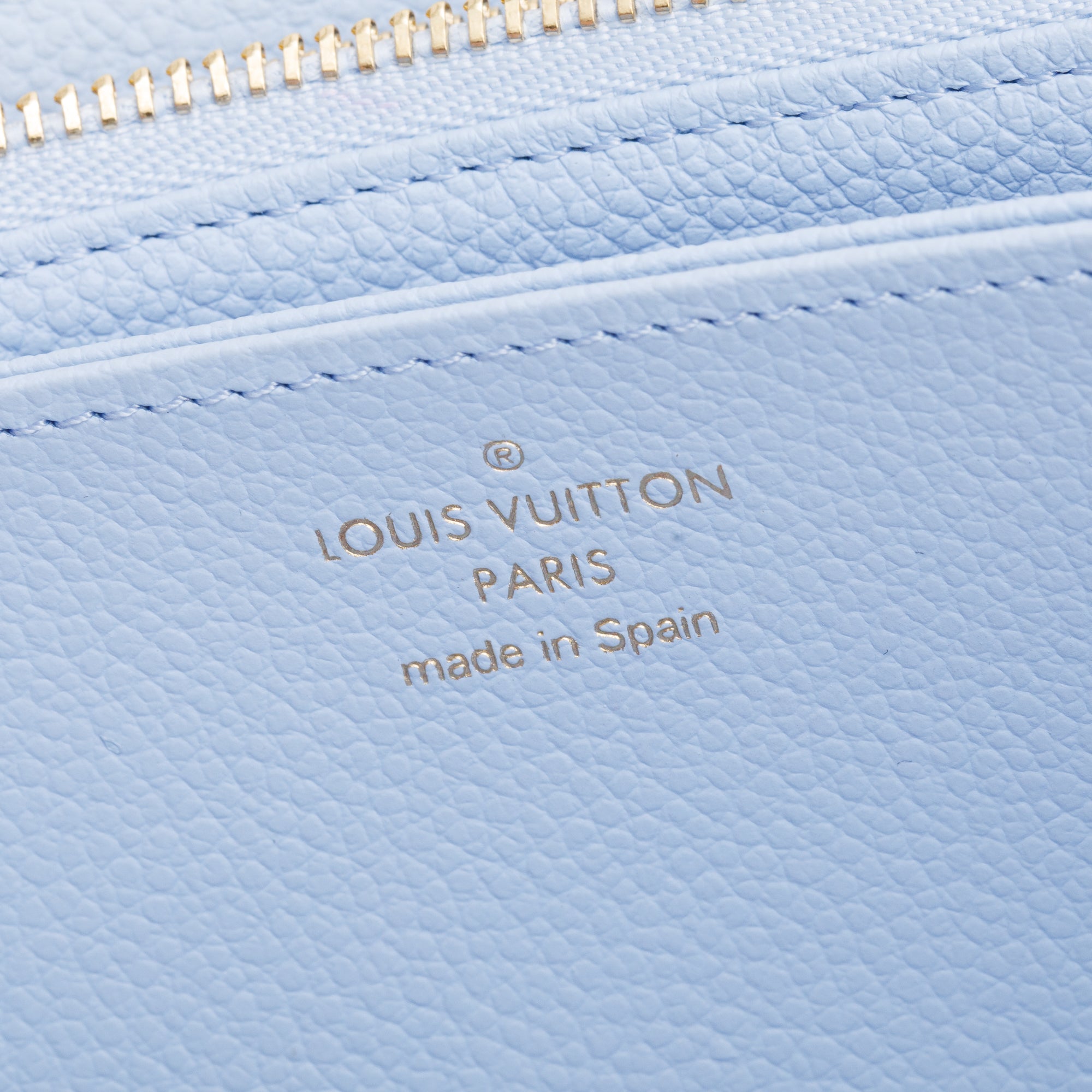Louis Vuitton Latte/Candy Blue Monogram Giant Bicolor Empreinte Leather Zippy Wallet