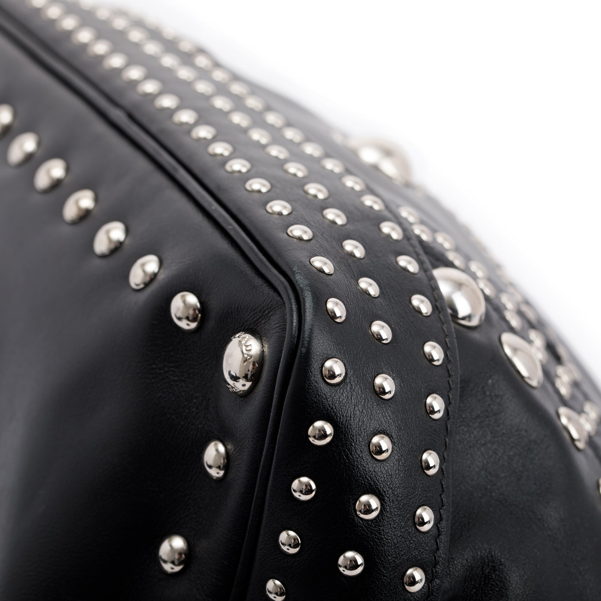 Prada Grommet Embellished City Calf Bucket Bag