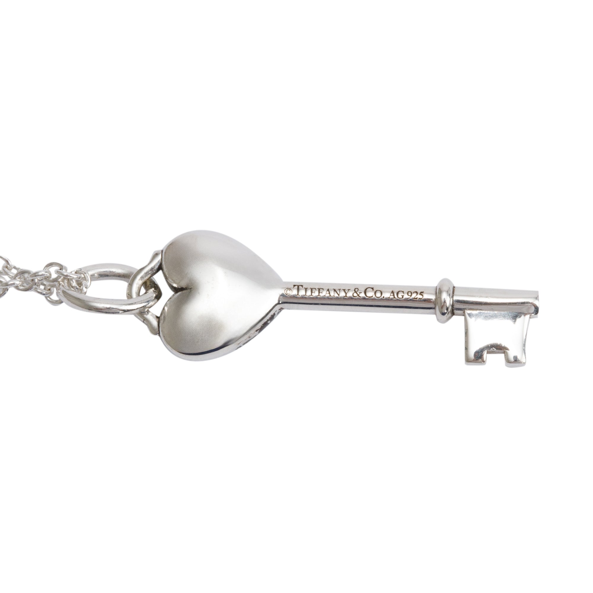 Tiffany & Co. Sterling Silver Blue Enamel Mini Heart Key Pendant Necklace