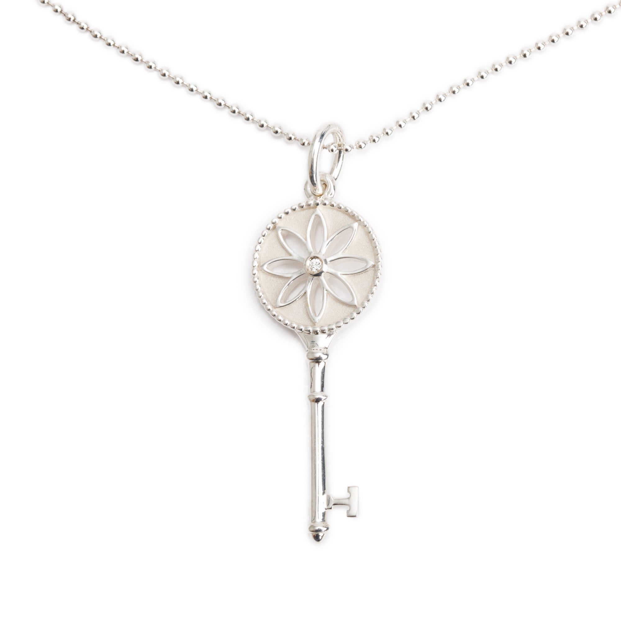 Tiffany & Co. Sterling Silver Diamond Small Daisy Key Pendant Necklace