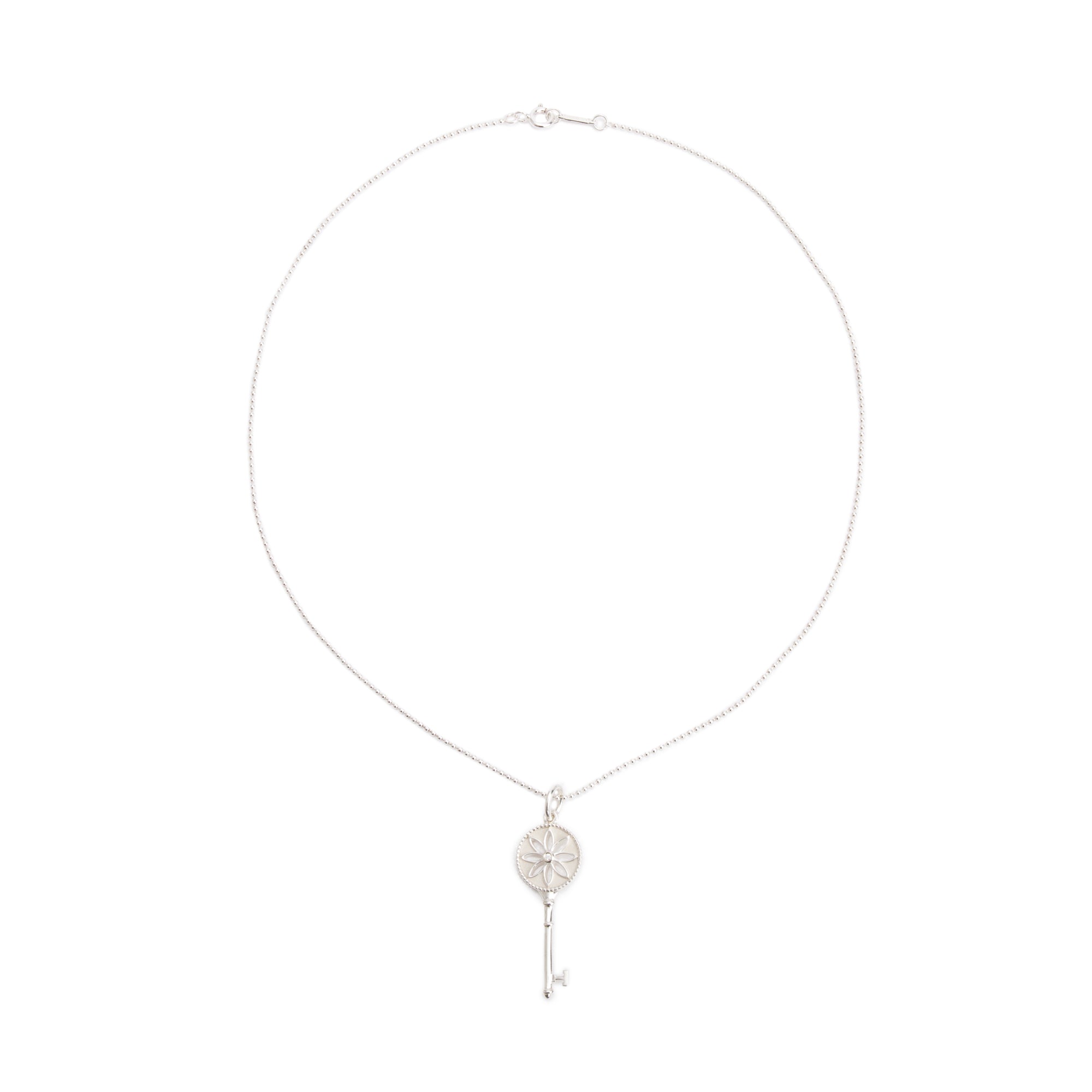 Tiffany & Co. Sterling Silver Diamond Small Daisy Key Pendant Necklace