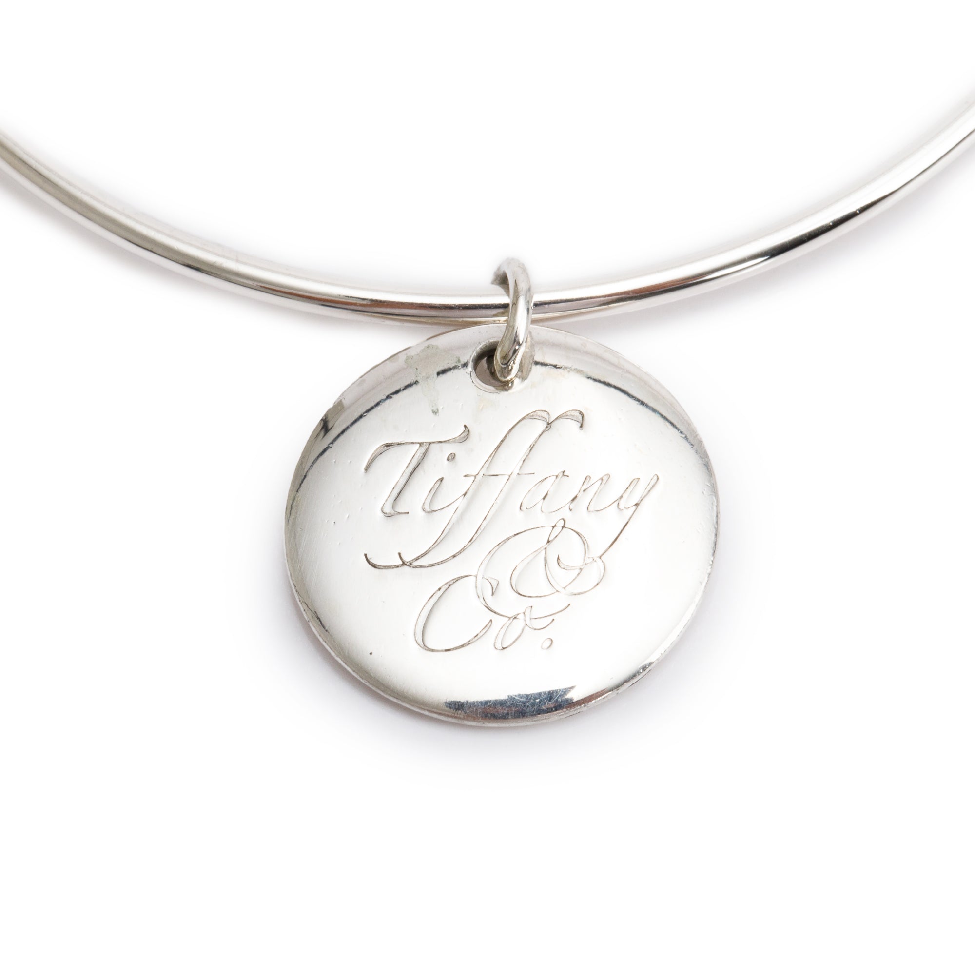 Tiffany & Co. Sterling Silver Round Tag Bangle Bracelet