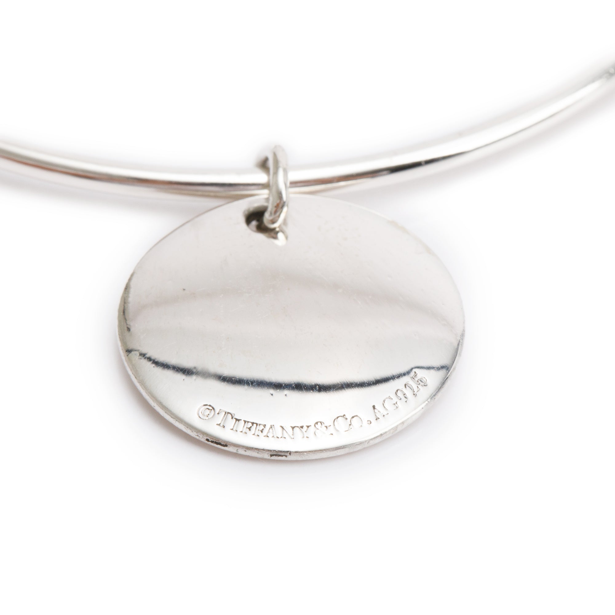 Tiffany & Co. Sterling Silver Round Tag Bangle Bracelet