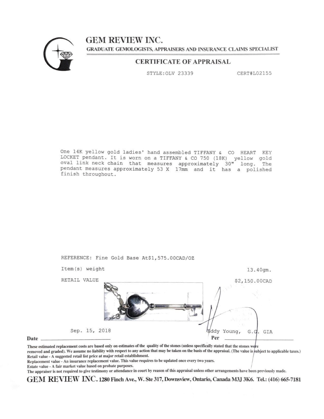Tiffany & Co. Heart Key Locket Pendant Necklace