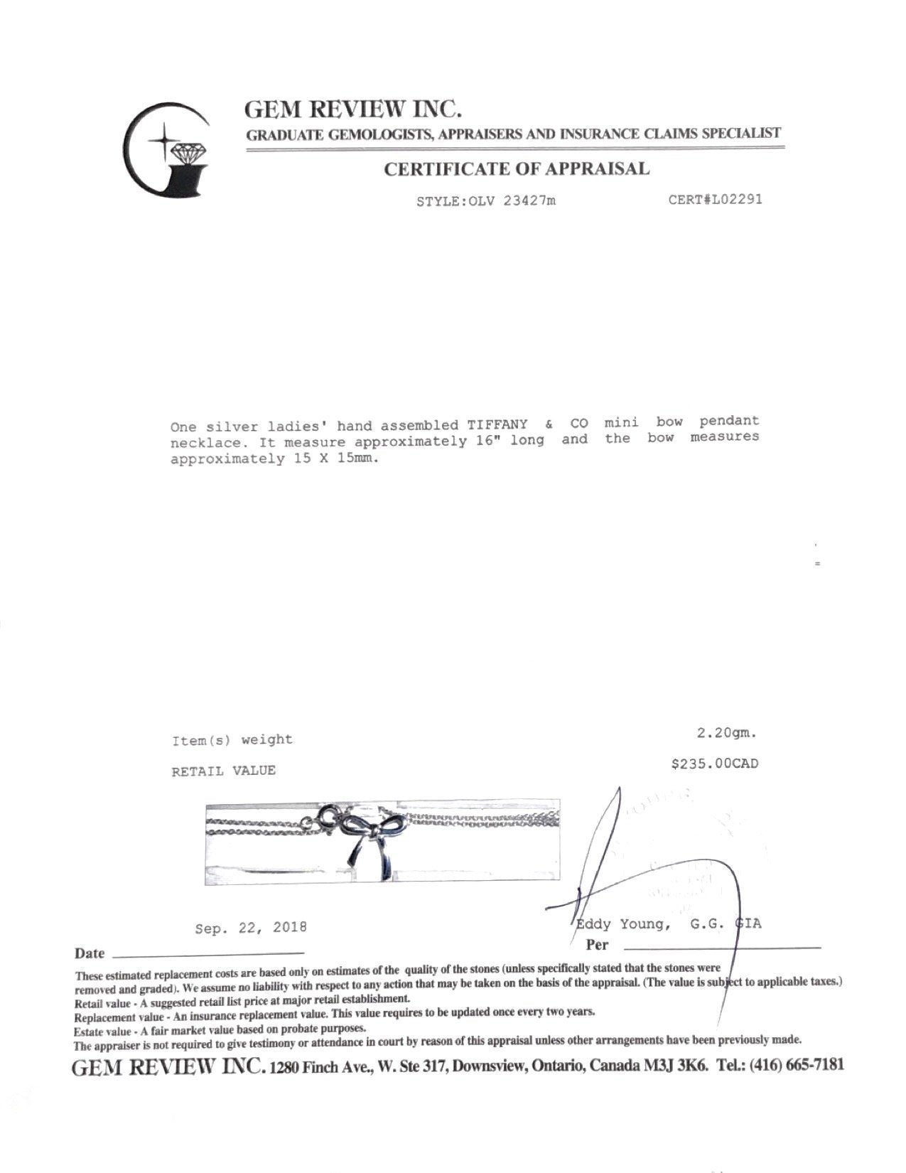 Tiffany & Co. Mini Bow Pendant Necklace