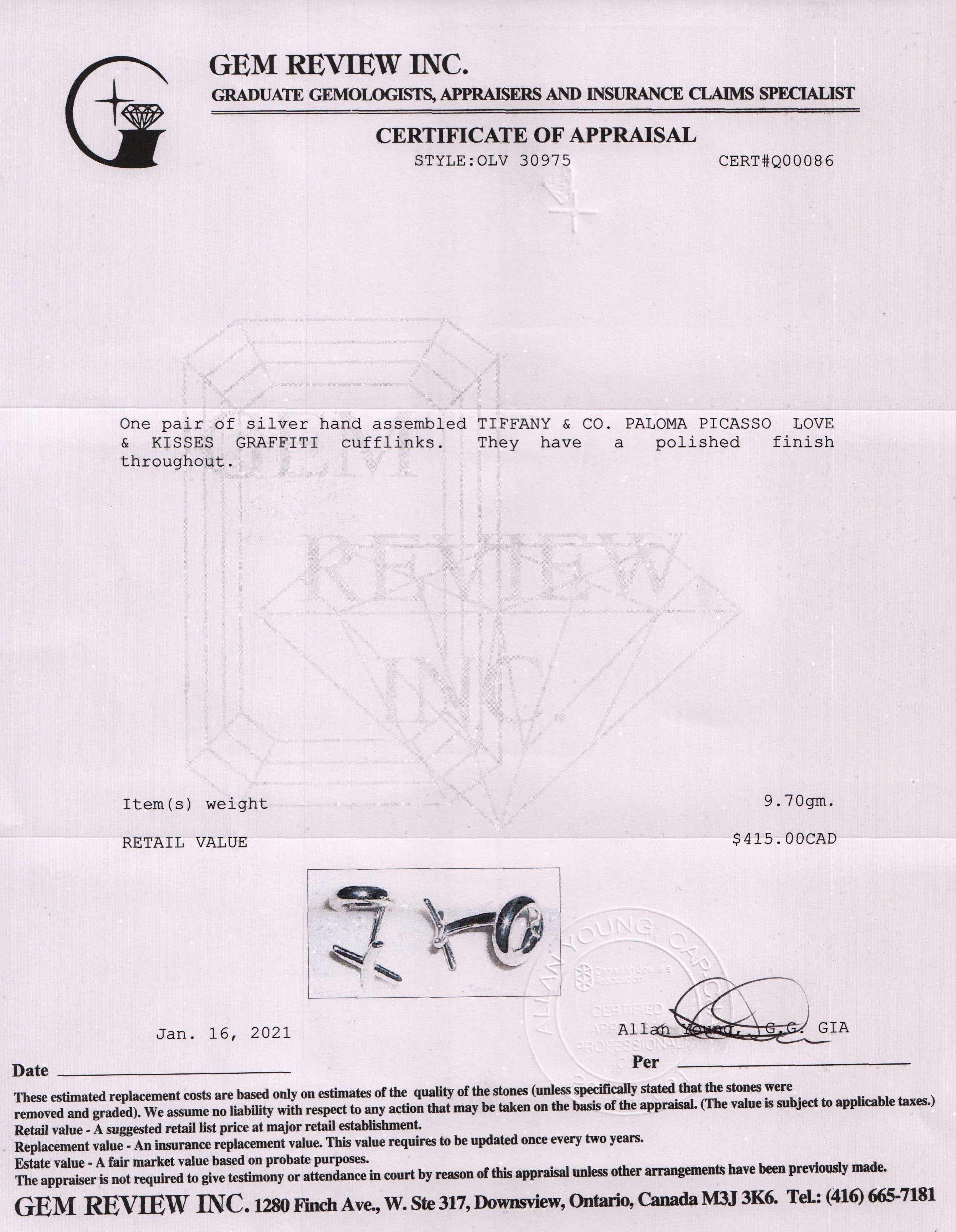 Tiffany & Co. Paloma Picasso Love & Kisses Cuff Links