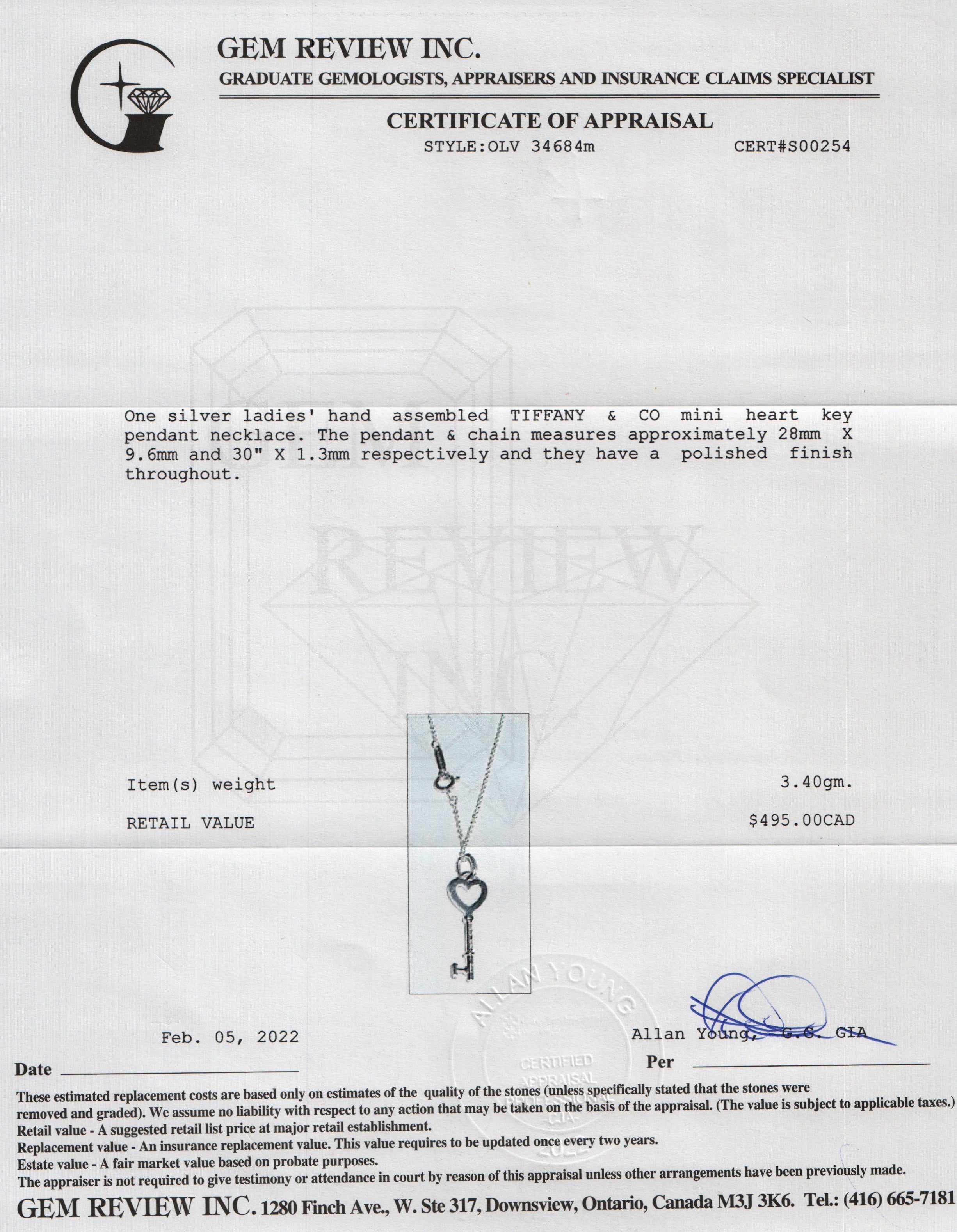Tiffany & Co. Mini Heart Key Pendant Necklace