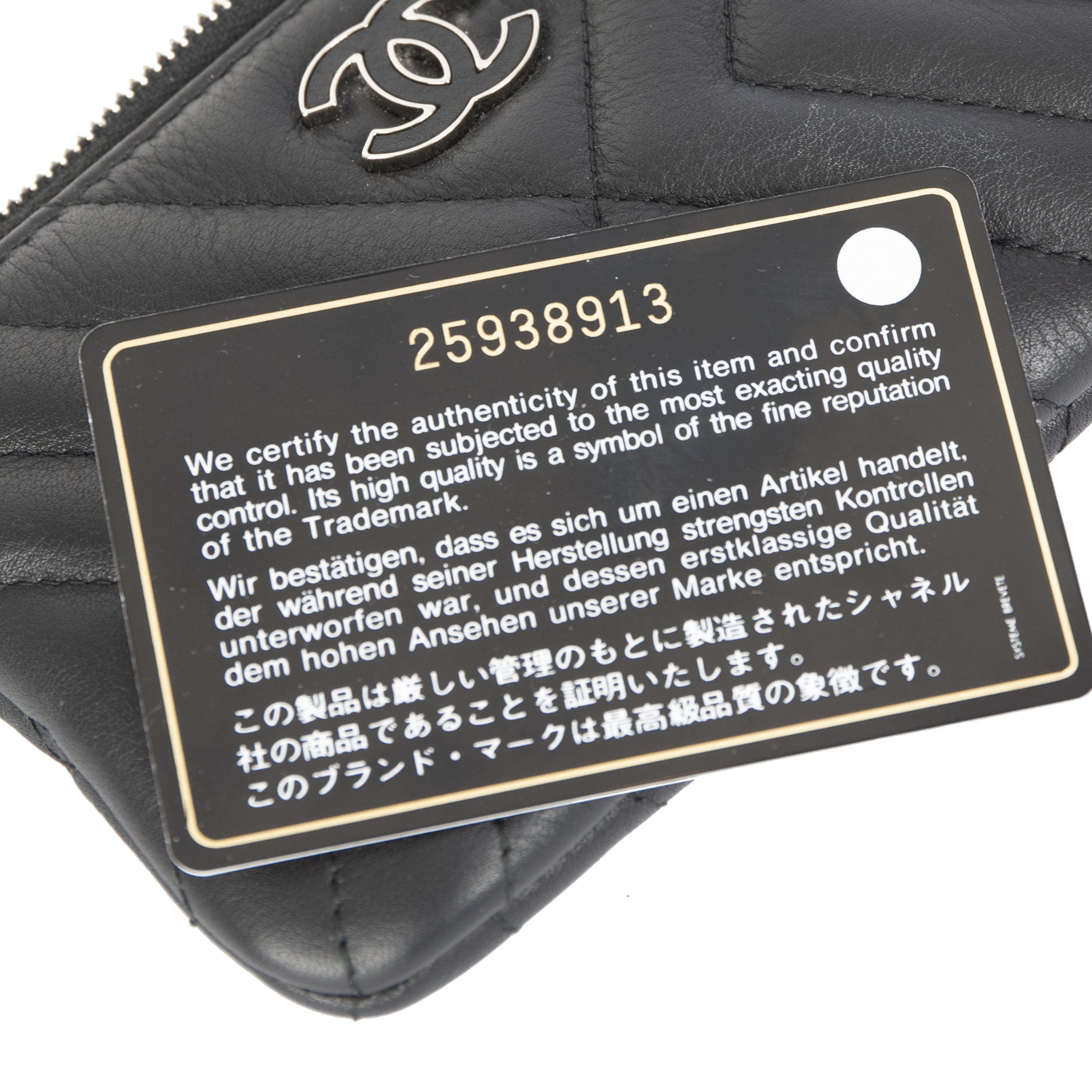 Chanel Black Chevron Tassel Mini Zip Pouch