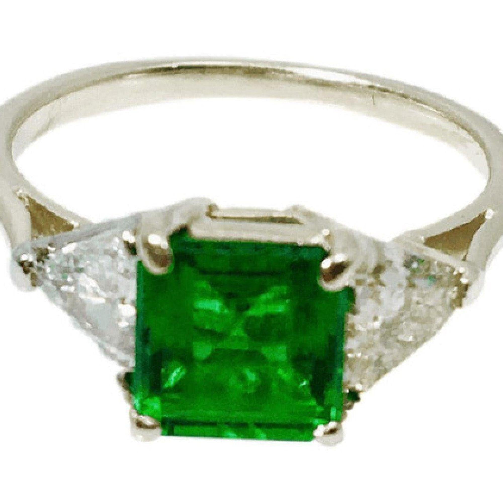 Emerald and Diamond Three Stone Ring