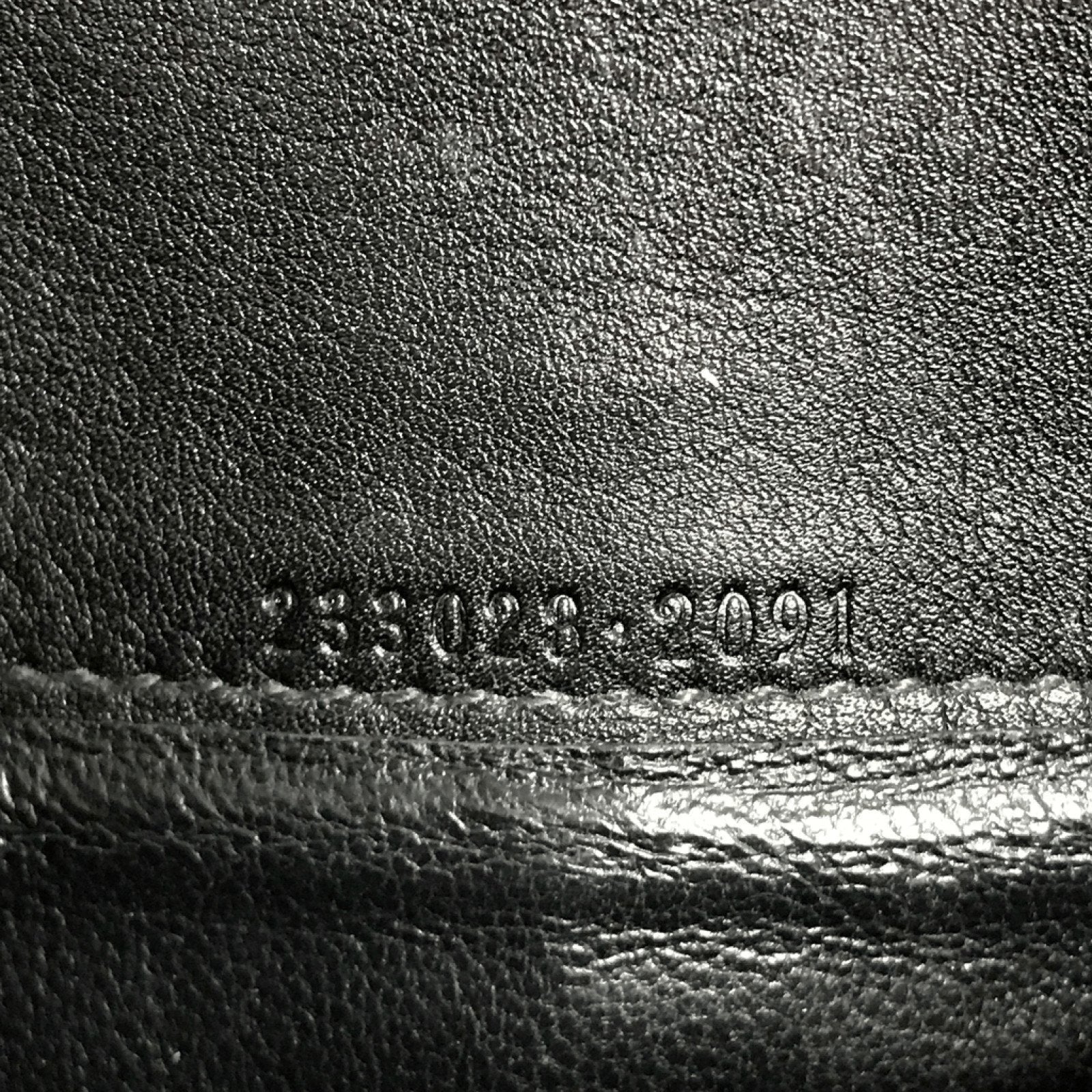 Gucci Black Leather Engraved Metal Plate Continental Wall