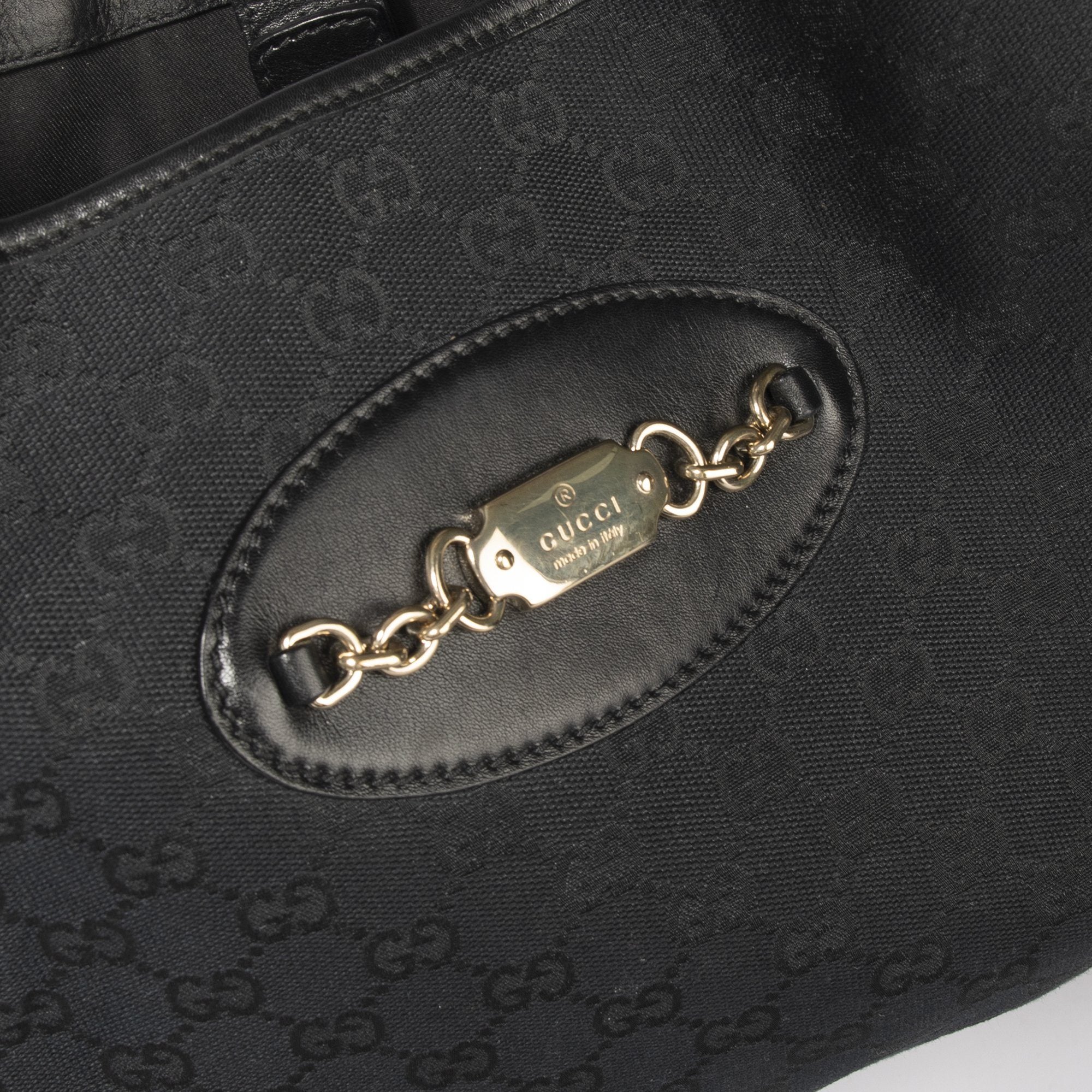 Gucci GG Canvas Punch Hobo