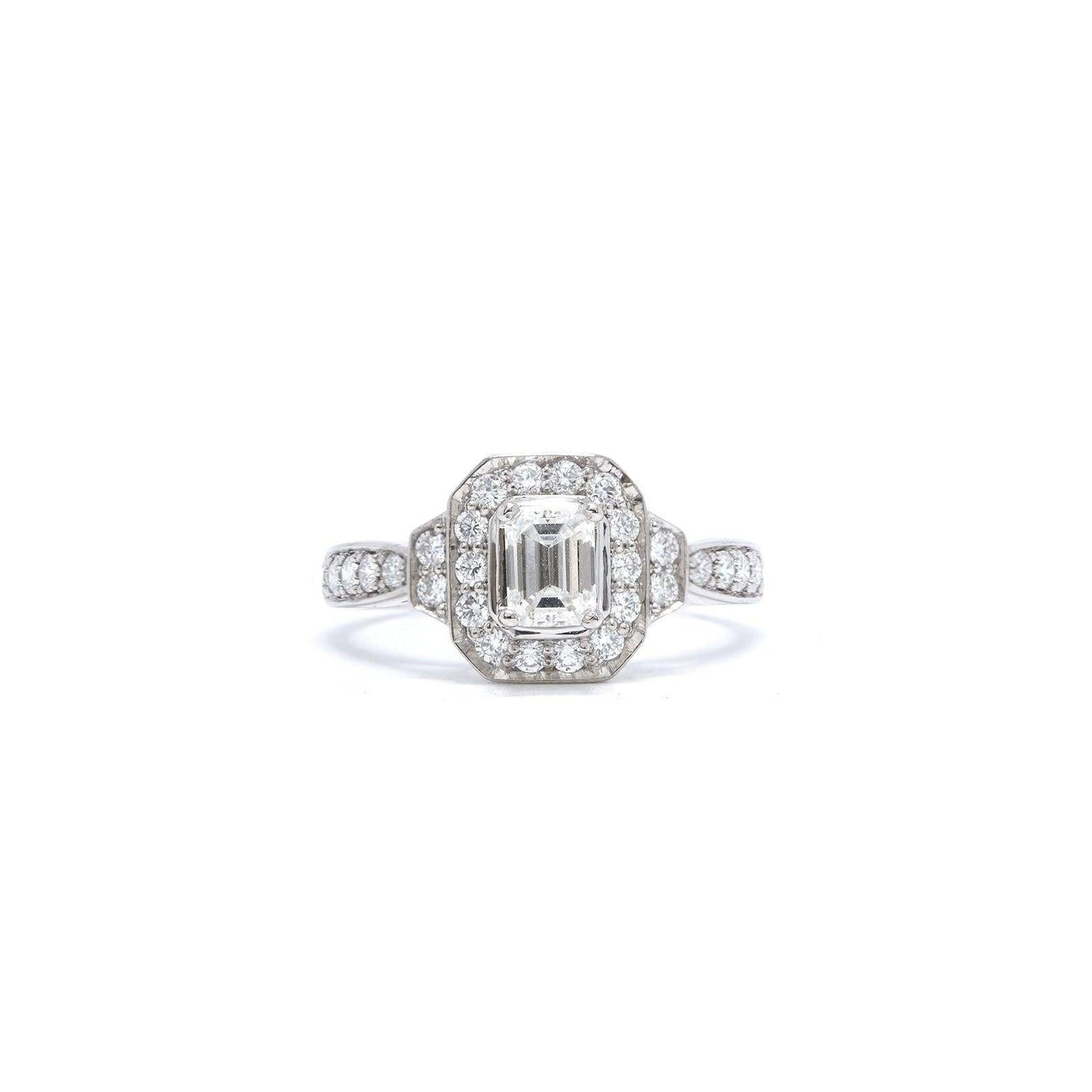Halo Design Emerald Cut Diamond Engagement Ring