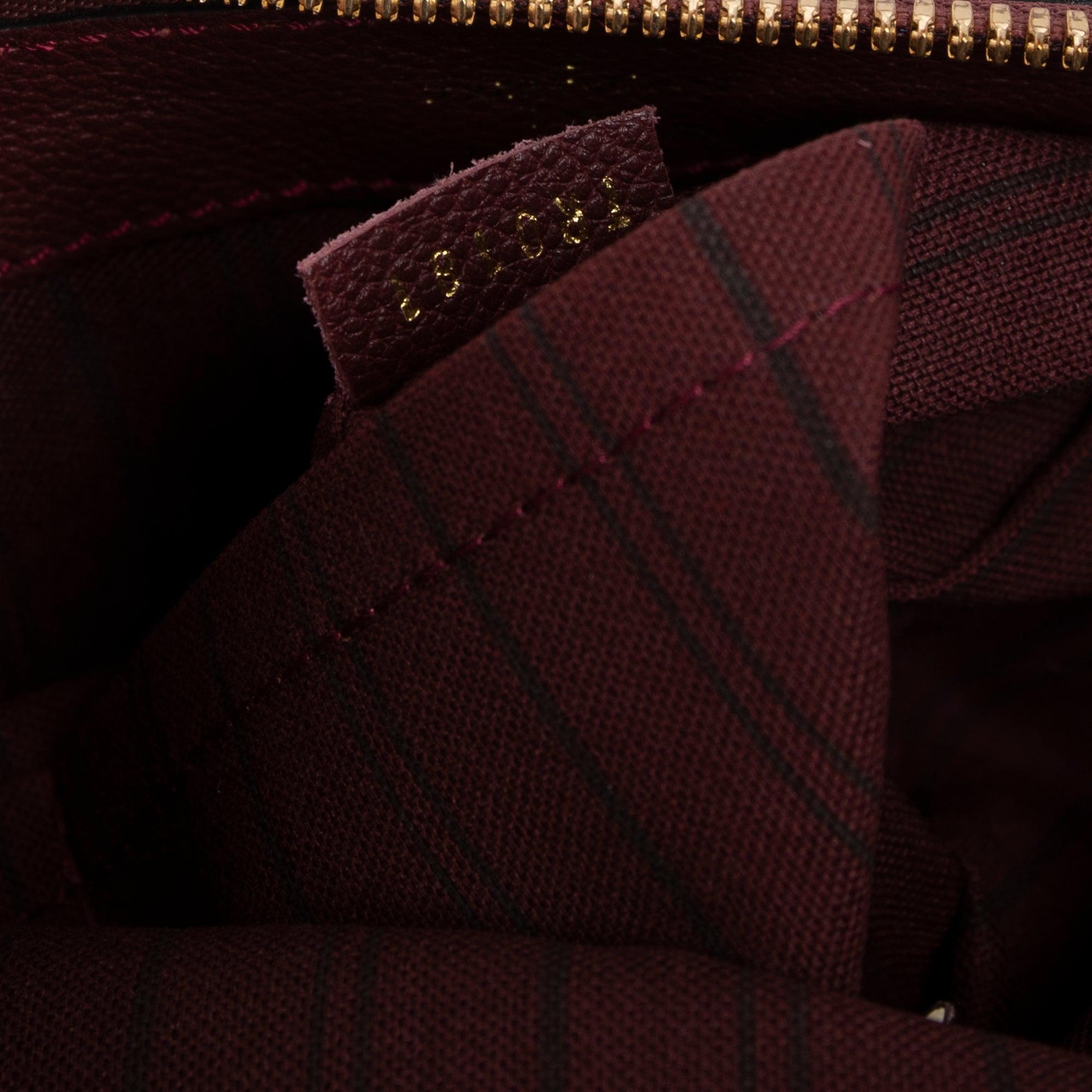 Louis Vuitton Monogram Empreinte Petillante Clutch