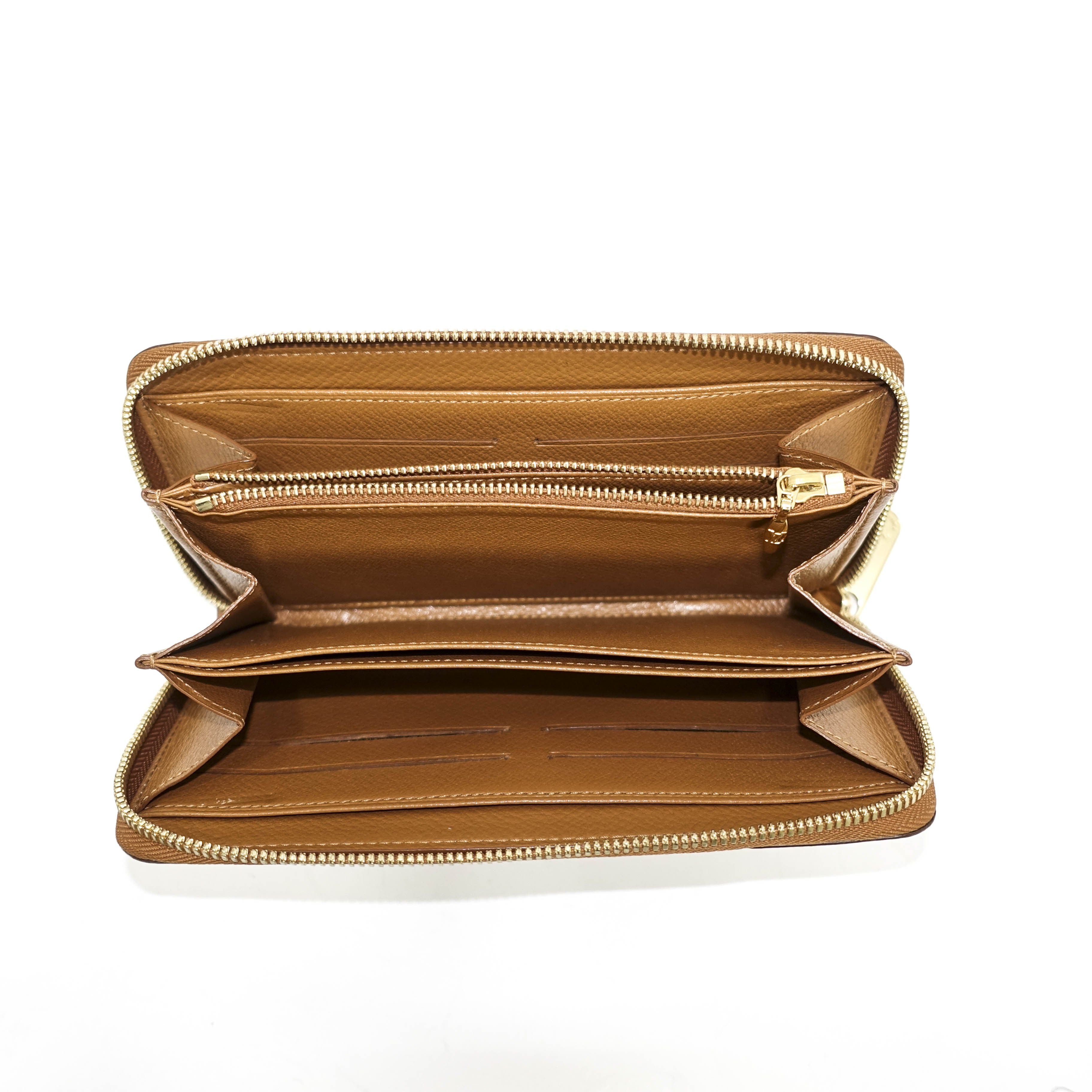 Louis Vuitton Ostrich Zippy Wallet