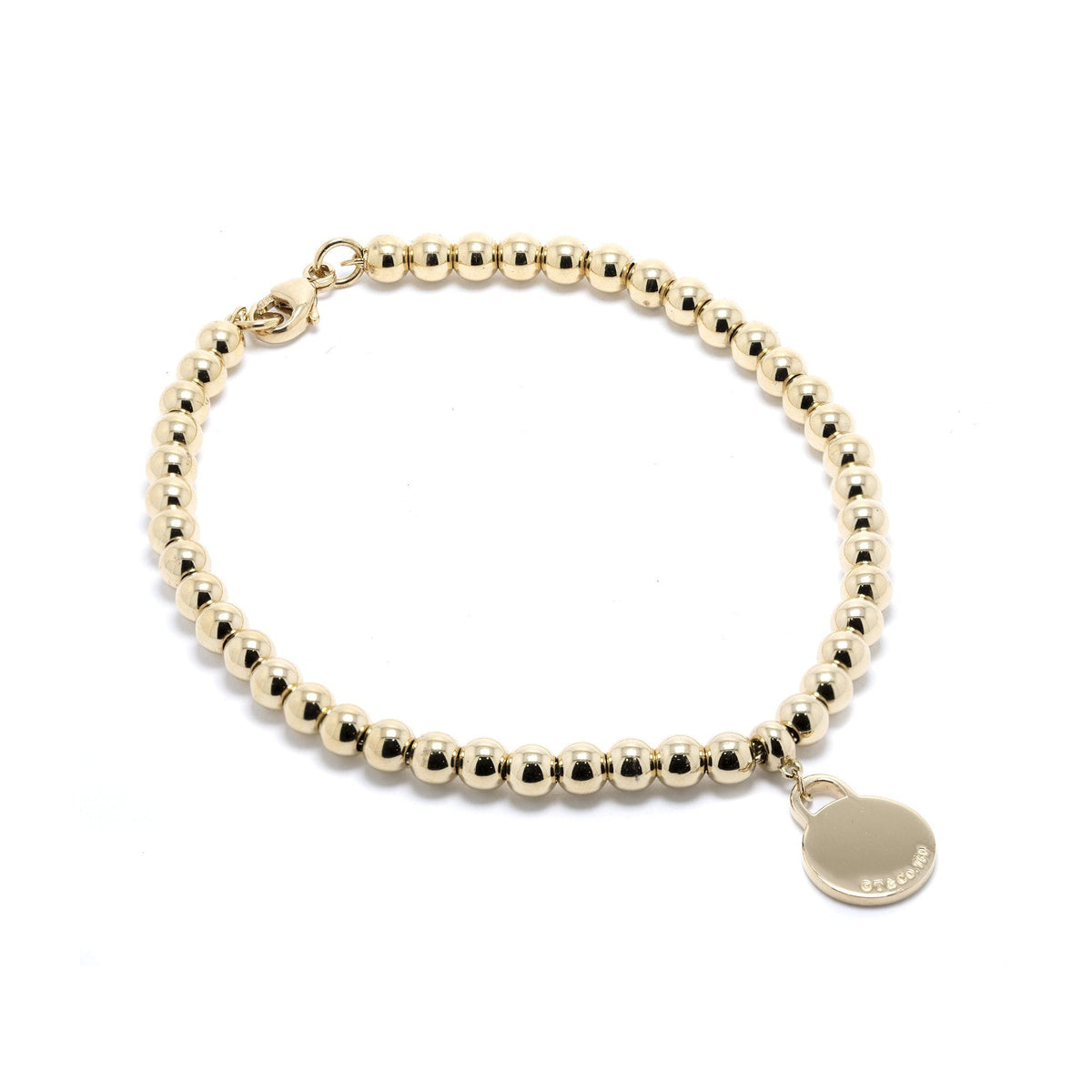 Tiffany & Co. 18k Gold Return to Tiffany Mini Round Tag Bead Bracelet