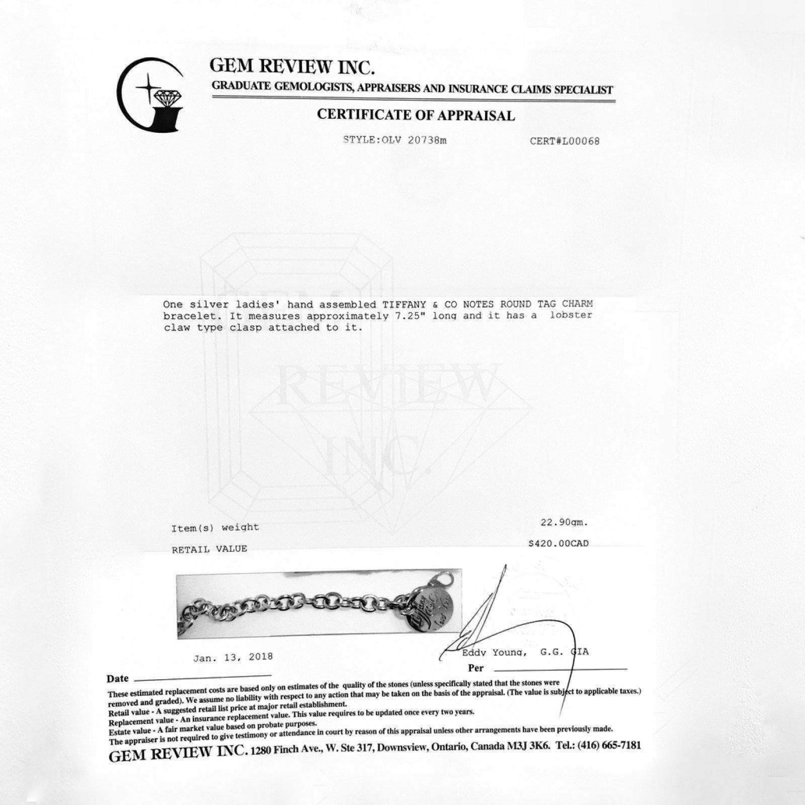 Tiffany & Co. Notes Round Tag Charm Bracelet in Sterling Silver