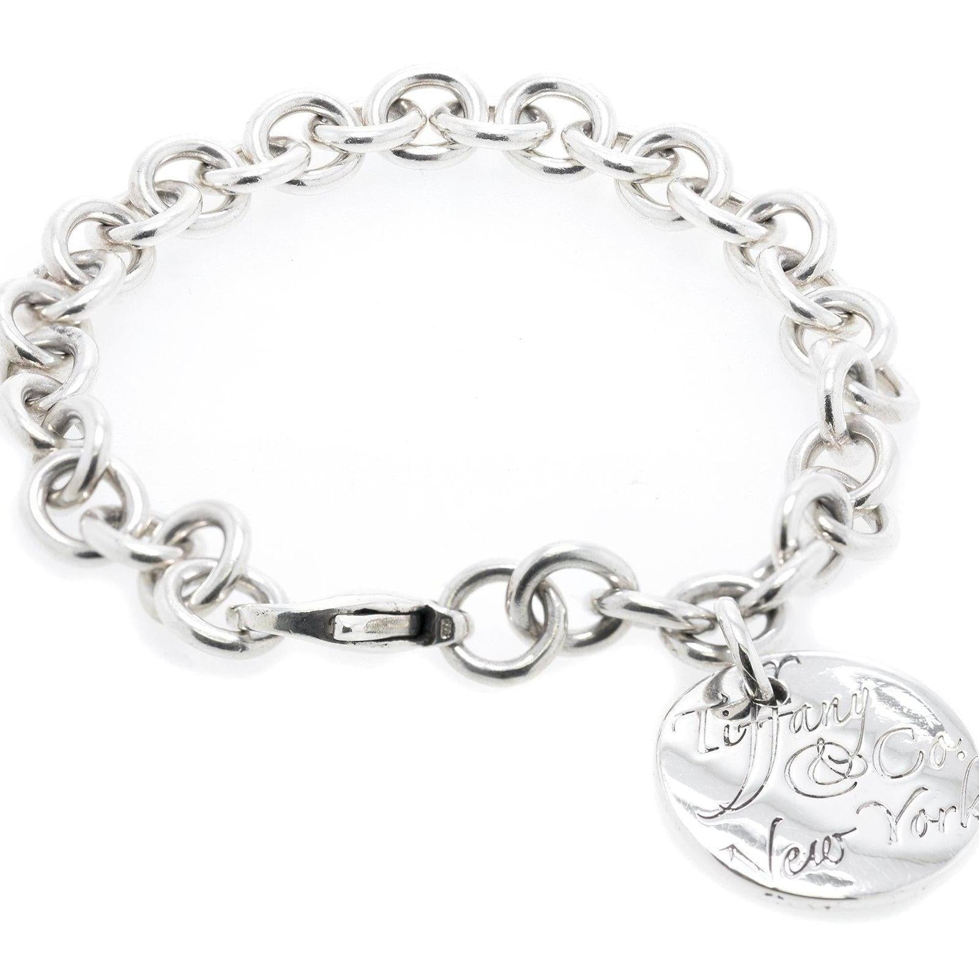 Tiffany & Co. Notes Round Tag Charm Bracelet