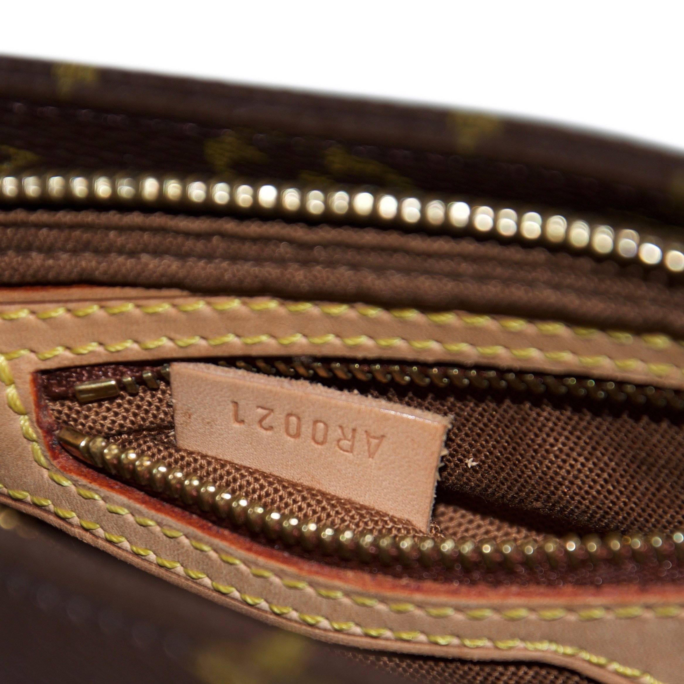 Louis Vuitton Monogram Trotteur Bag