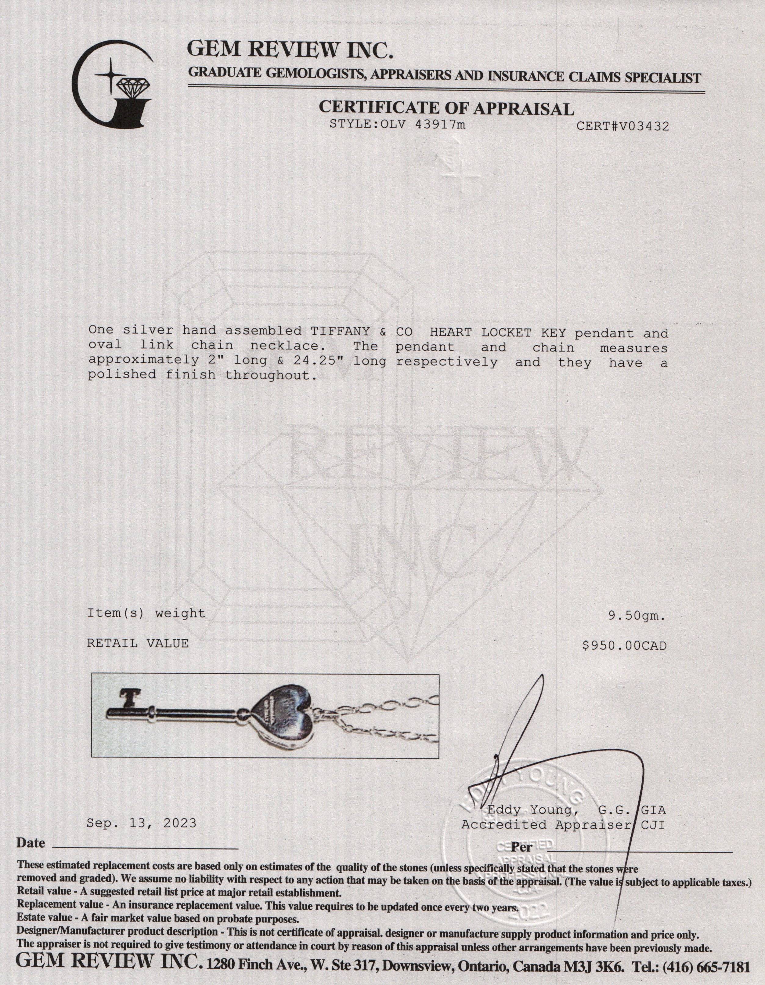 Tiffany & Co. Sterling Silver Heart Locket Key Pendant Necklace