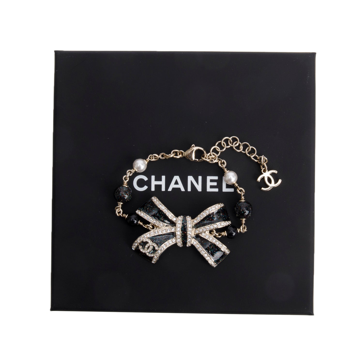 Chanel 2025 Gold Plated Faux Pearl, Strass & Bead CC Bow Charm Bracelet w/ Box & Receipt
