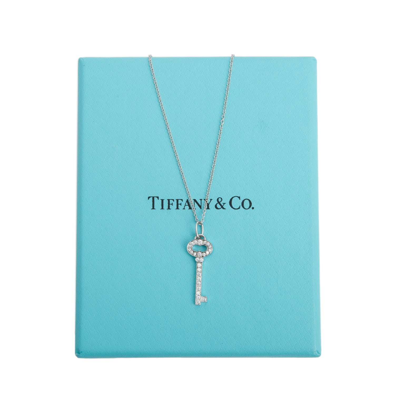Tiffany & Co. 18k White Gold Mini Diamond Oval Key Pendant Necklace w/ Box