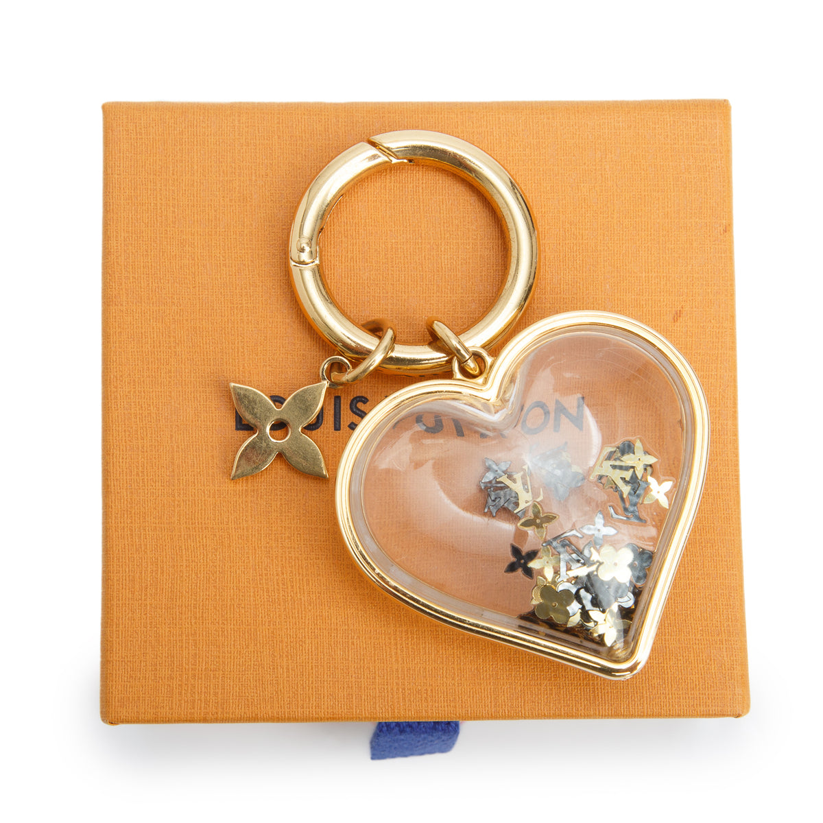 Louis Vuitton 2022 Gold-Tone Plexiglass Heart I LV U Bag Charm w/ Box