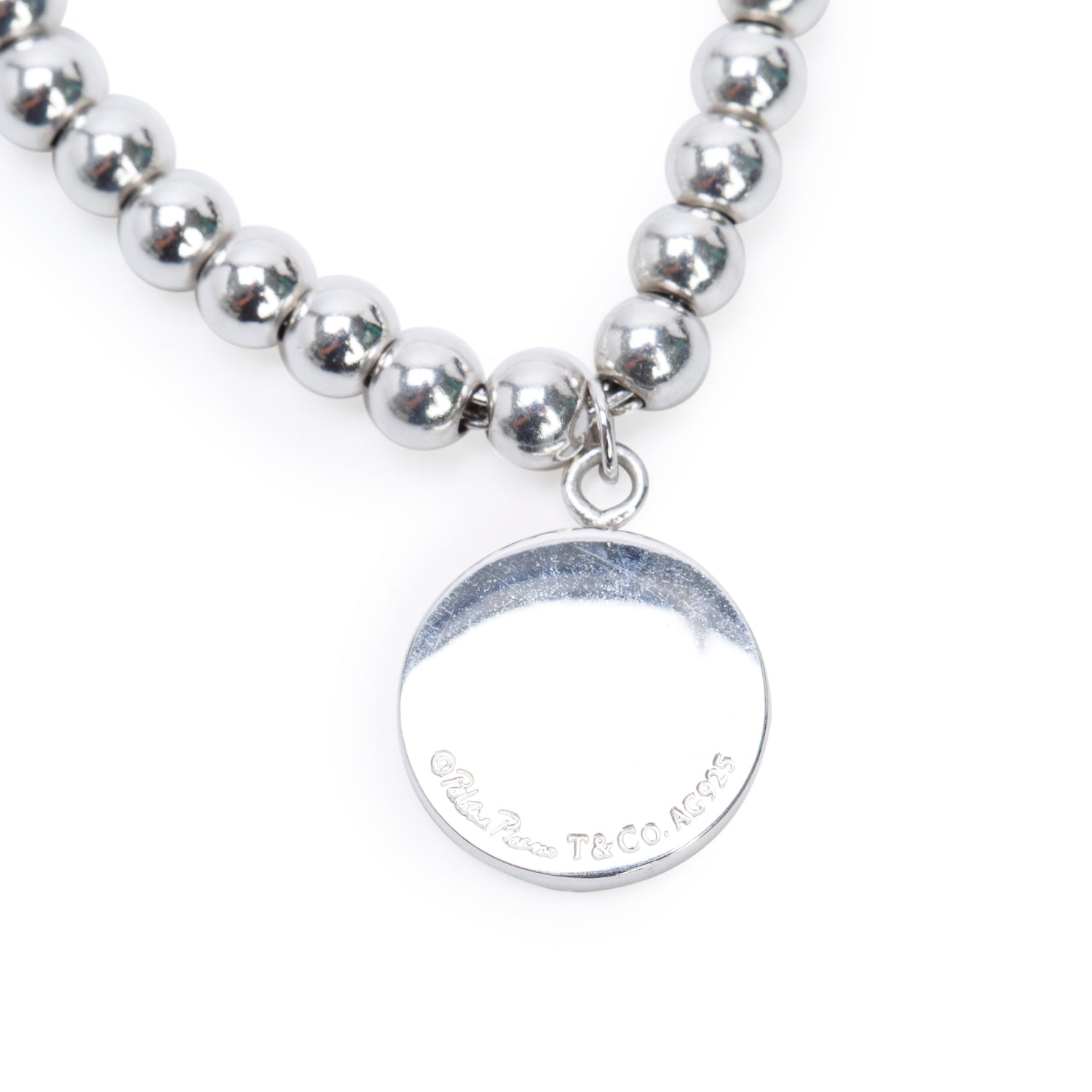 Tiffany & Co. Paloma Picasso Sterling Silver Loving Heart Round Charm 4 MM Bead Bracelet