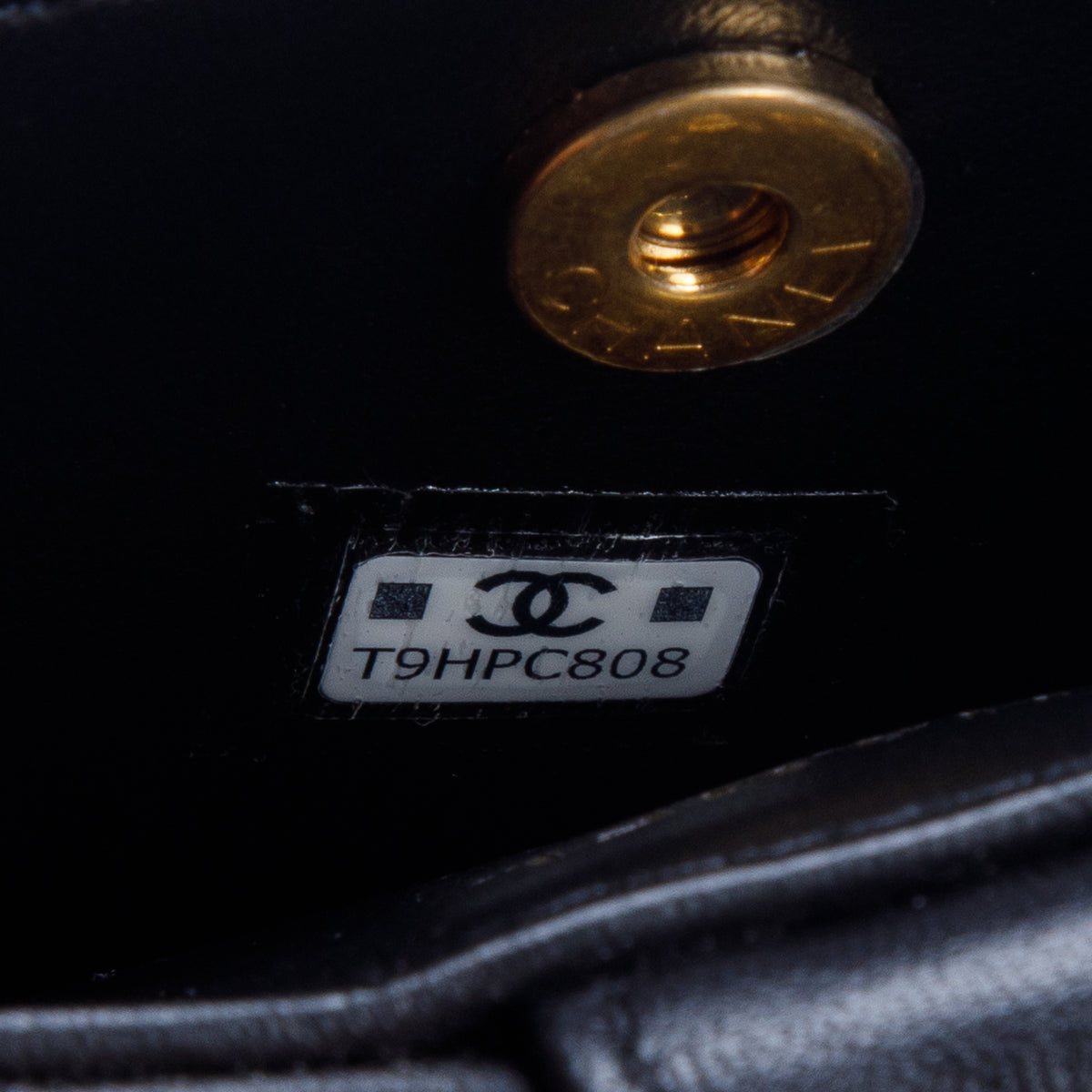 Chanel Lambskin Quilted Round Camellia Mini Clutch