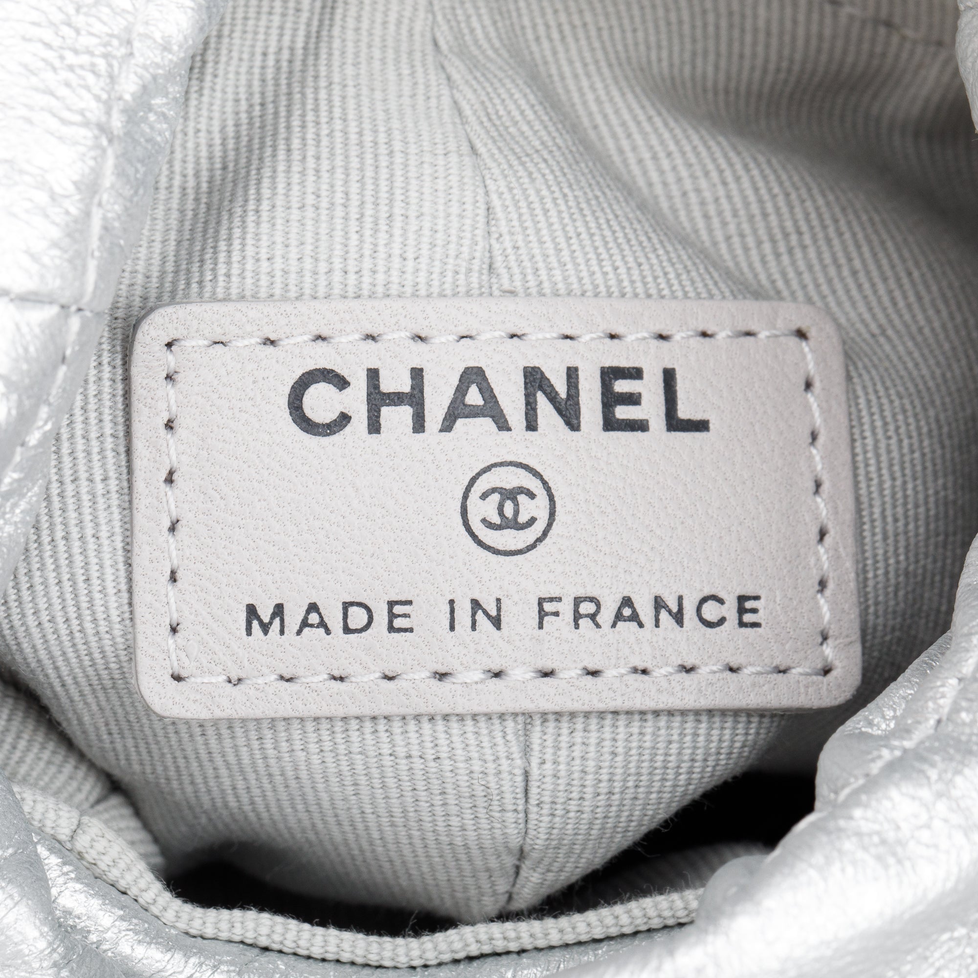 Chanel 2023 Metallic Silver Calfskin Leather Micro Drawstring Bucket Bag w/ Receipt