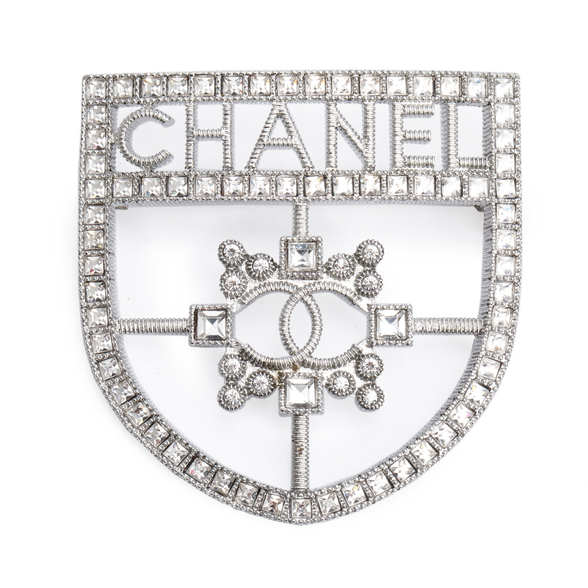 Strass Logo Chanel Palladium Plated Strass Logo Shield Brooch – OLIVER'S