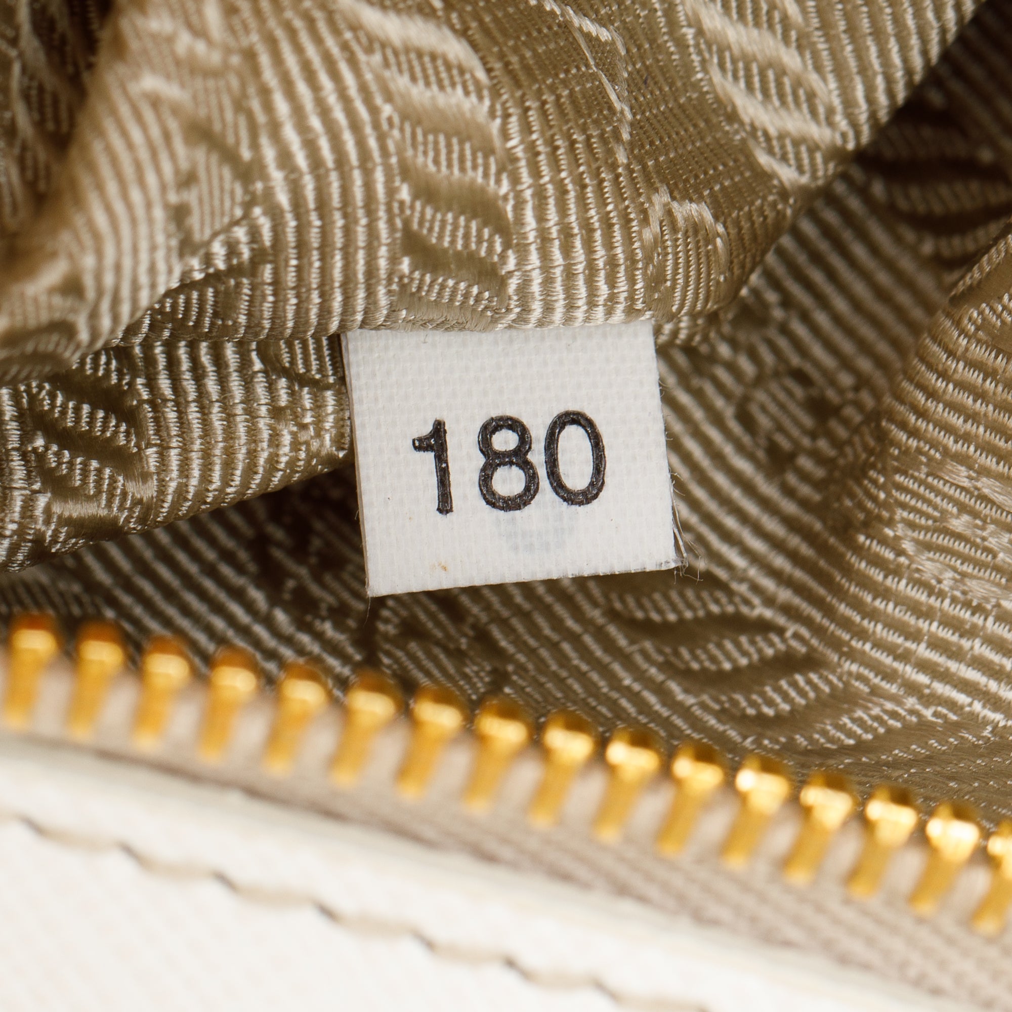 Prada White Perforated Saffiano Leather Fori Baguette Bag