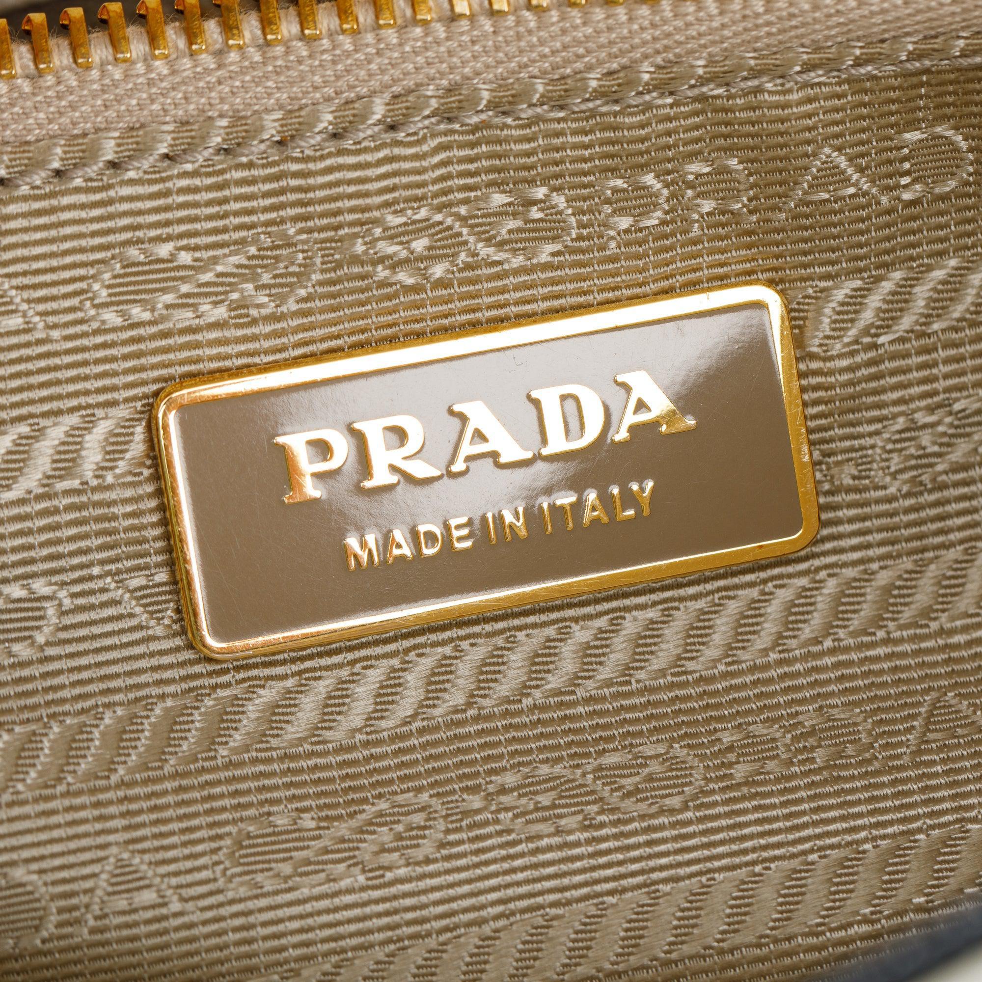 Prada White Perforated Saffiano Leather Fori Baguette Bag