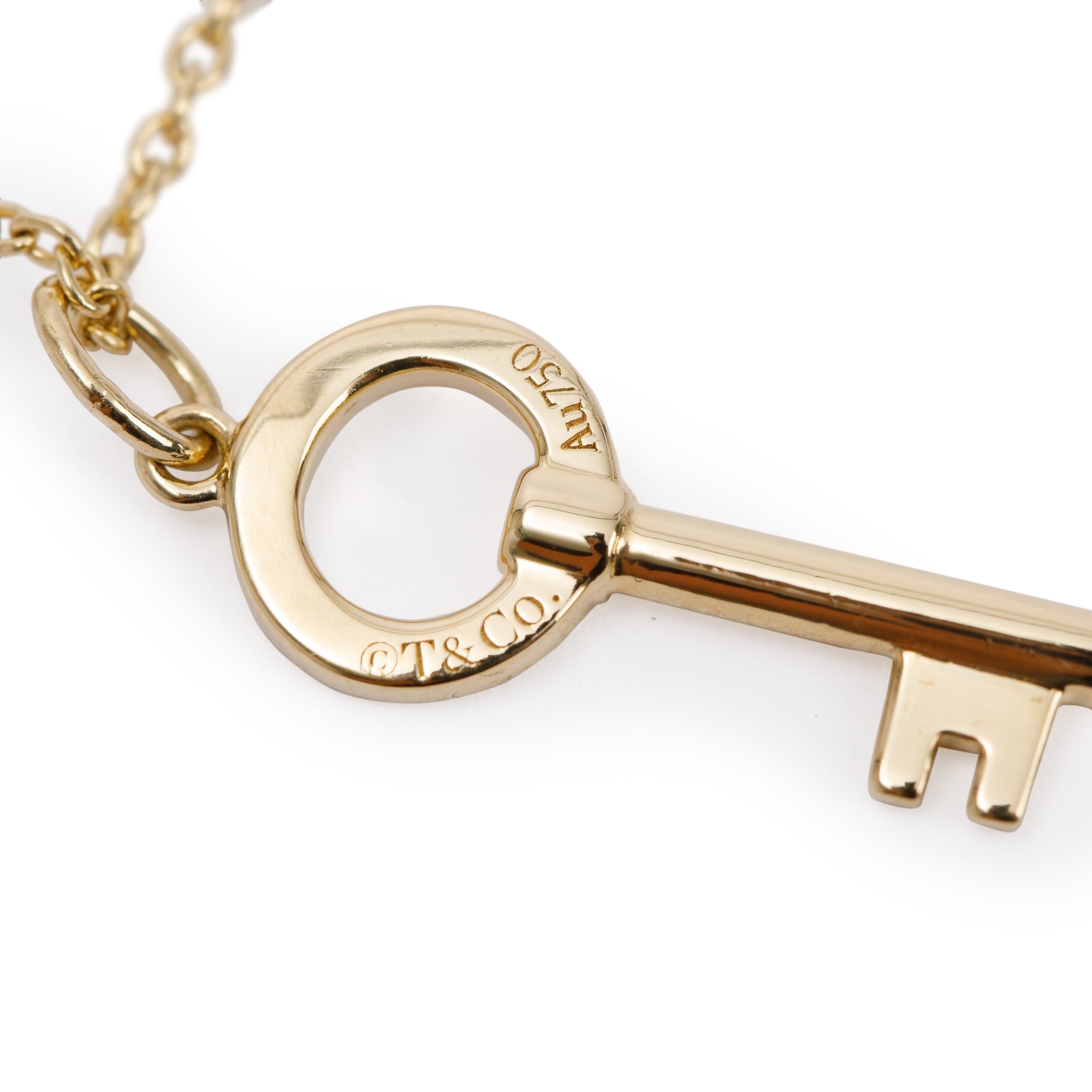 Tiffany & Co. 18k Yellow Gold Diamond Mini Modern Keys Open Round Key Pendant Necklace