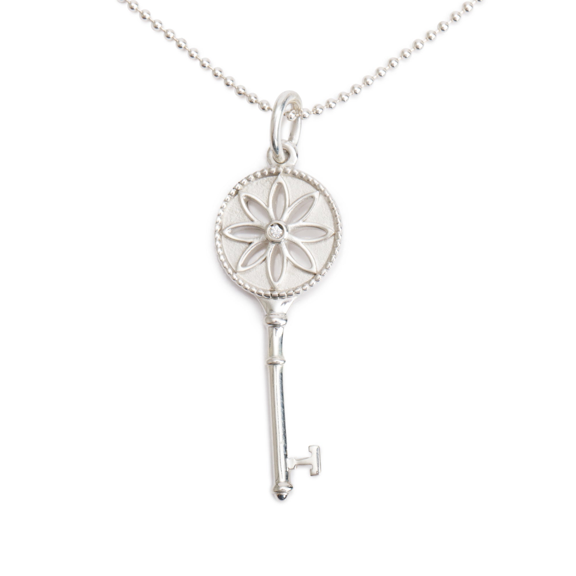 Tiffany & Co. Sterling Silver Diamond Small Daisy Key Pendant Necklace
