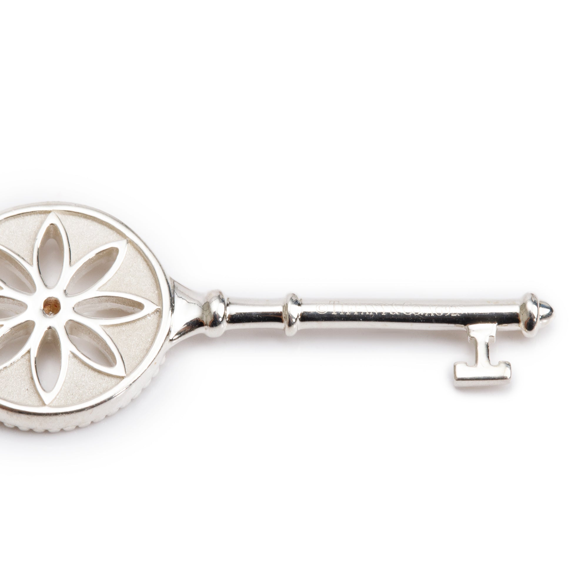Tiffany & Co. Sterling Silver Diamond Small Daisy Key Pendant Necklace