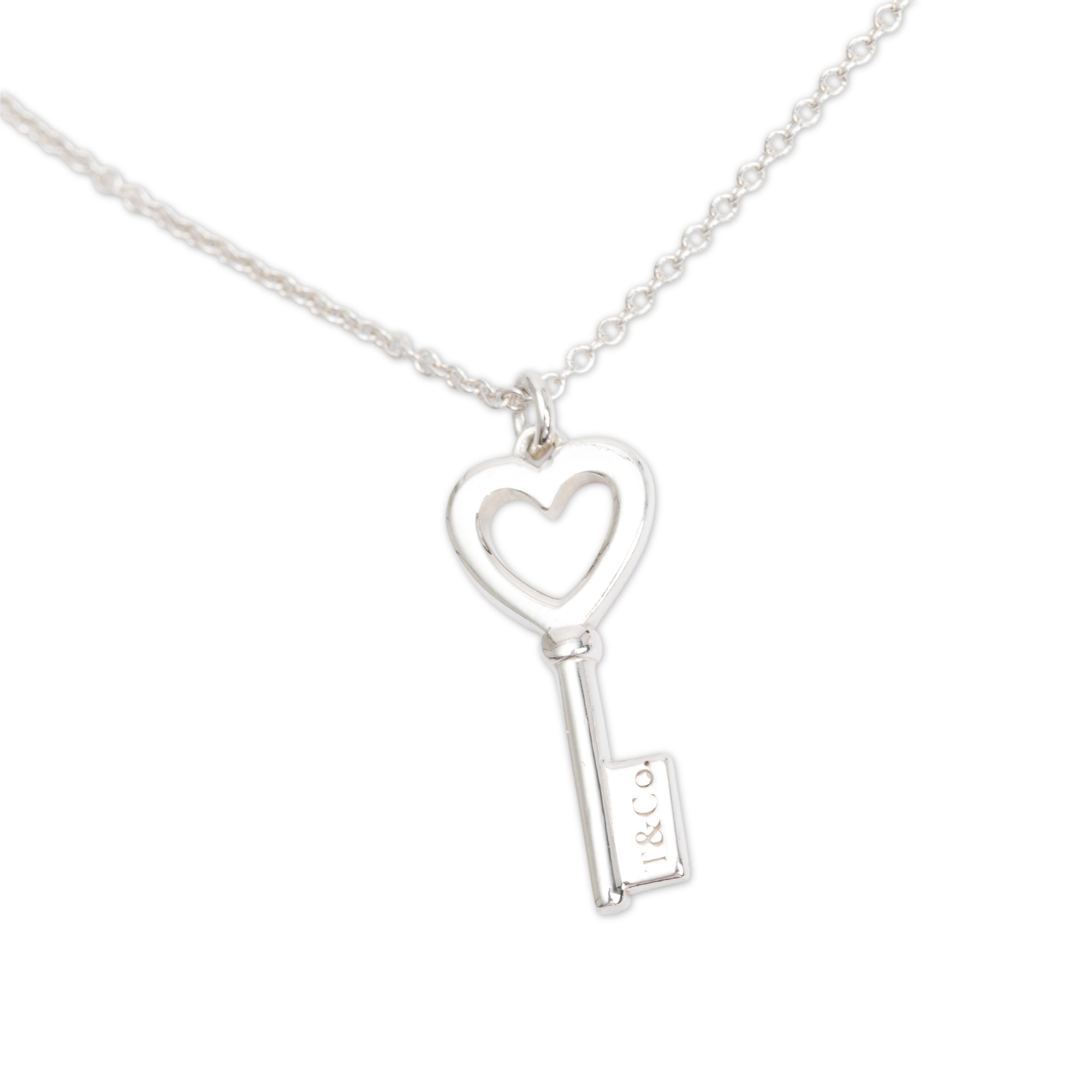 Tiffany & Co. Sterling Silver Mini Heart Key Pendant Necklace