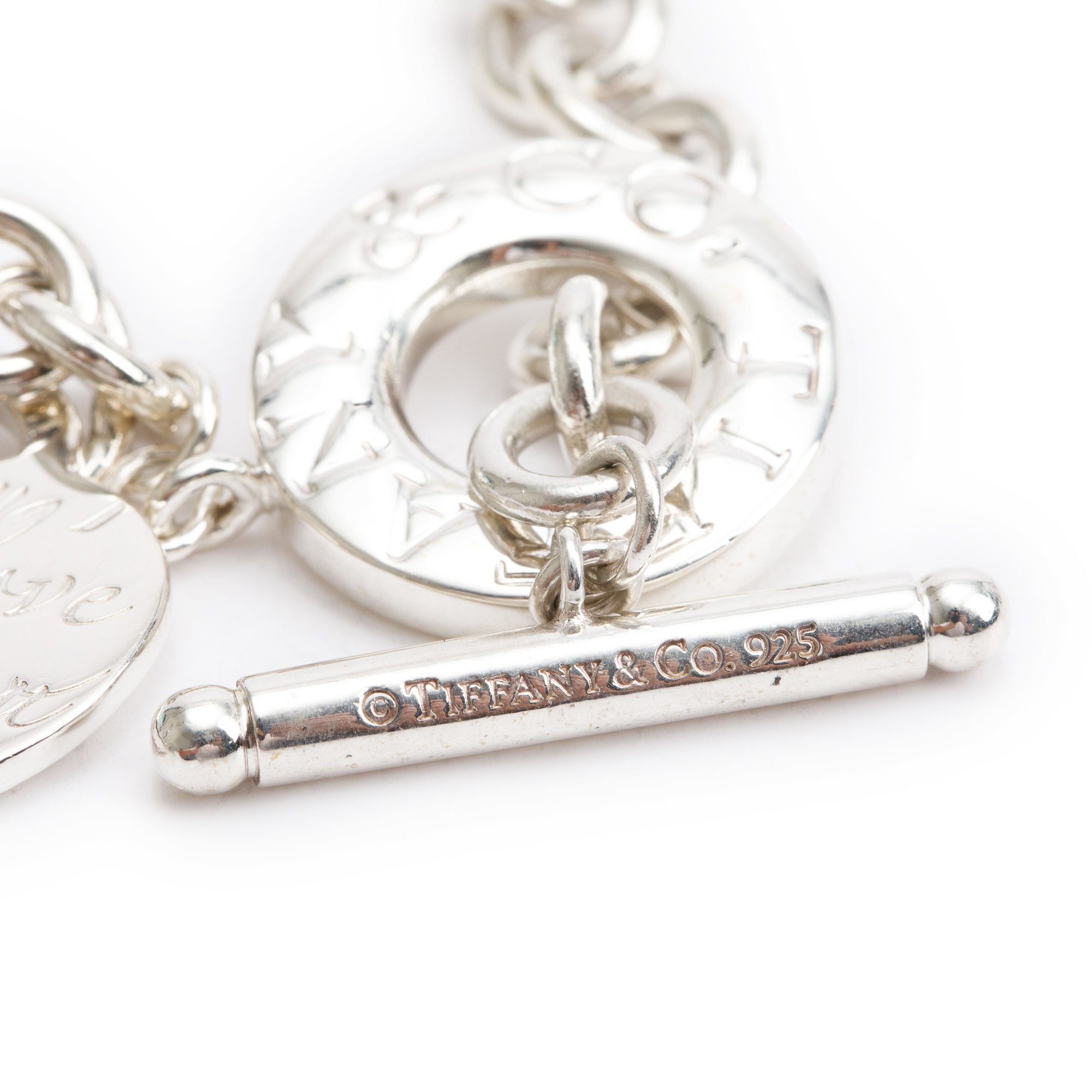Tiffany & Co. Sterling Silver Notes 'I Love You' Heart Tag Charm Bracelet with Toggle Clasp