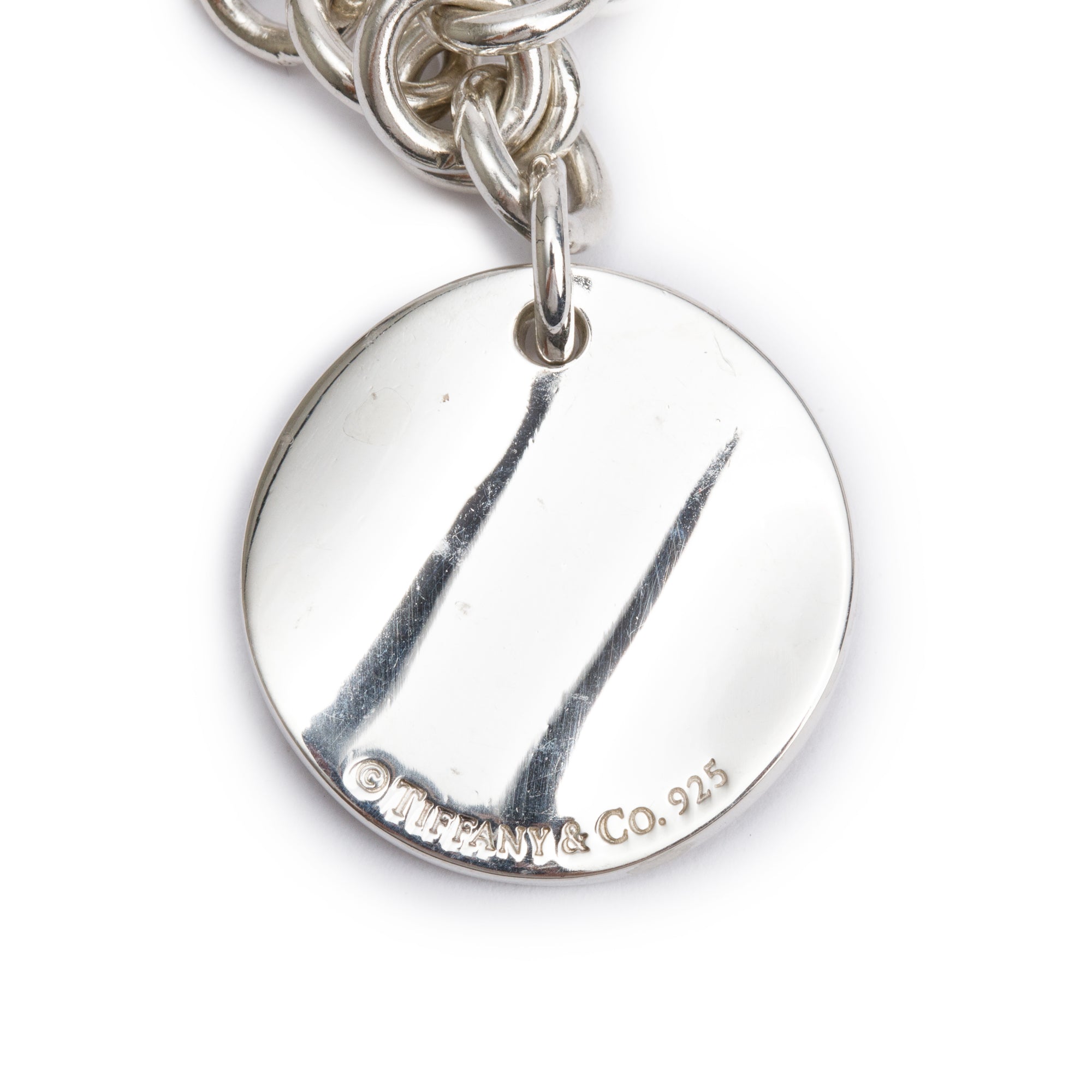 Tiffany & Co. Sterling Silver Notes Round Tag Charm Bracelet