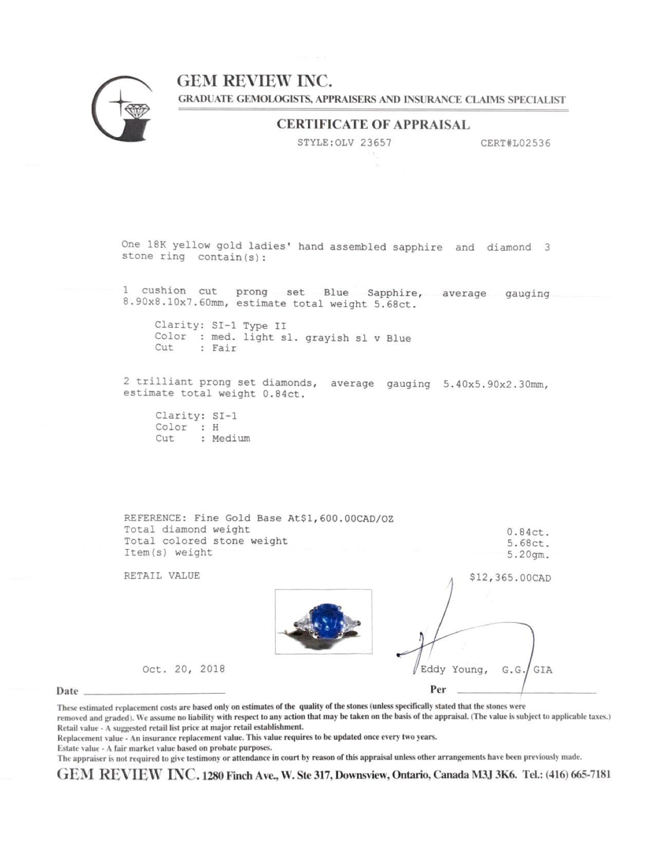 Blue Sapphire and Diamond Three Stone Ring