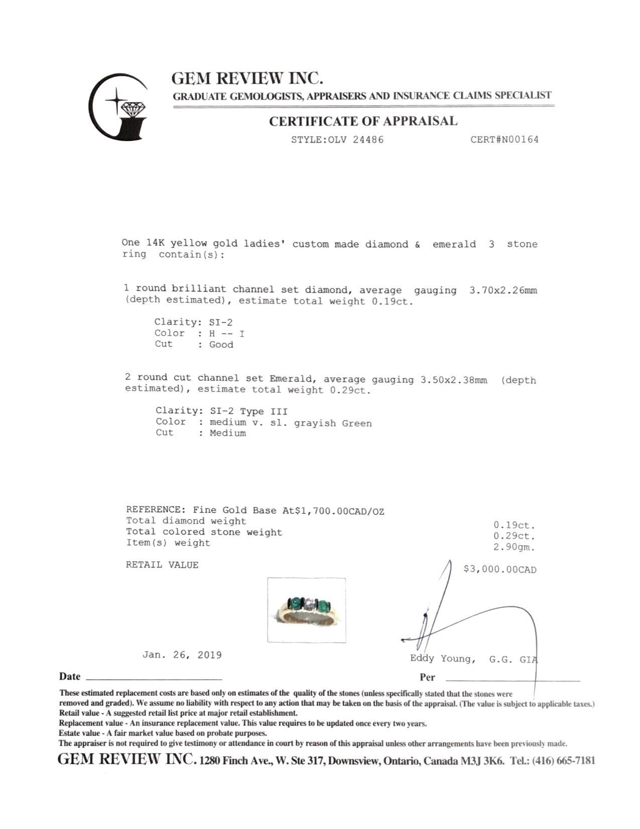 Emerald and Diamond Three Stone Ring