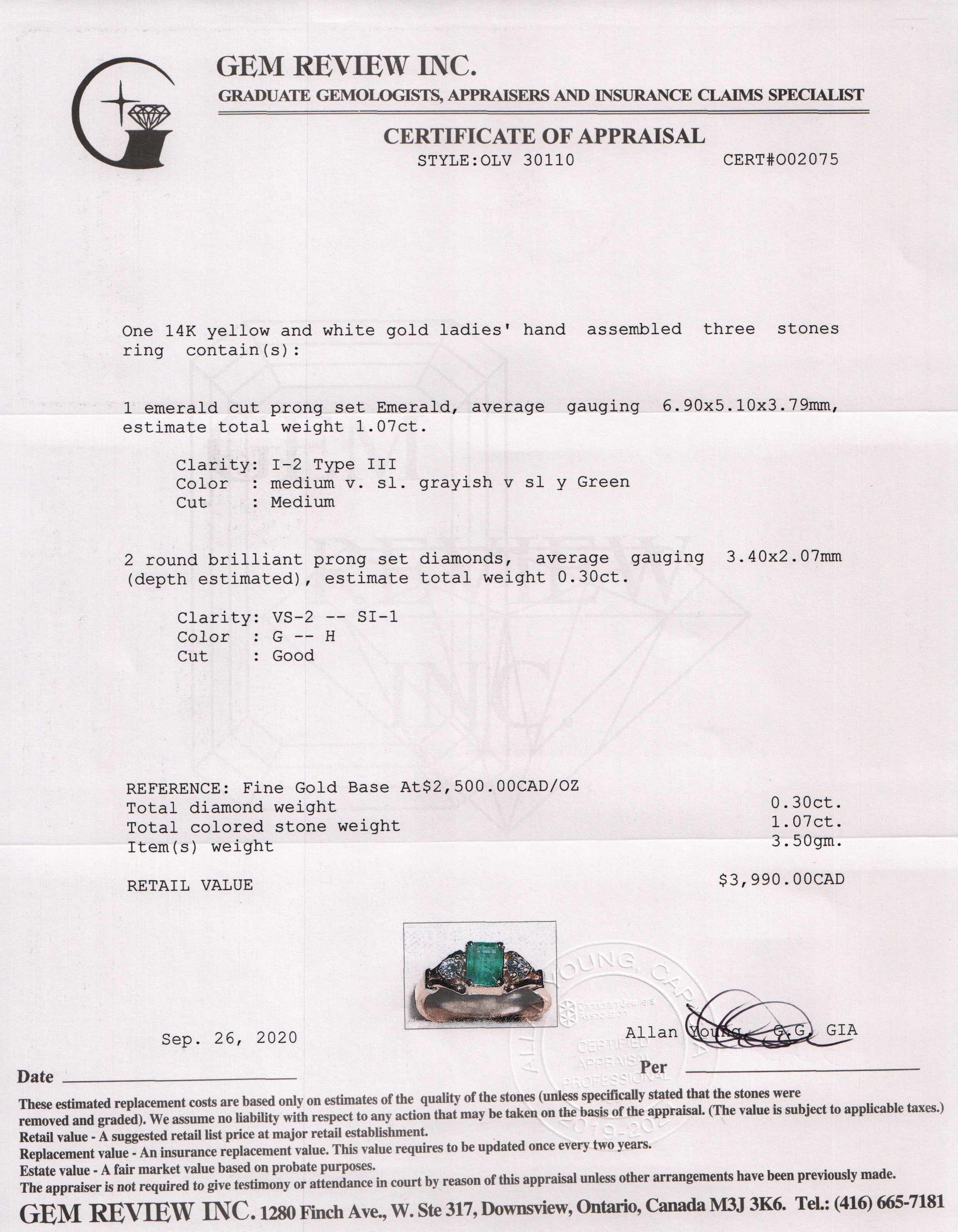 Emerald and Diamond Three Stone Ring