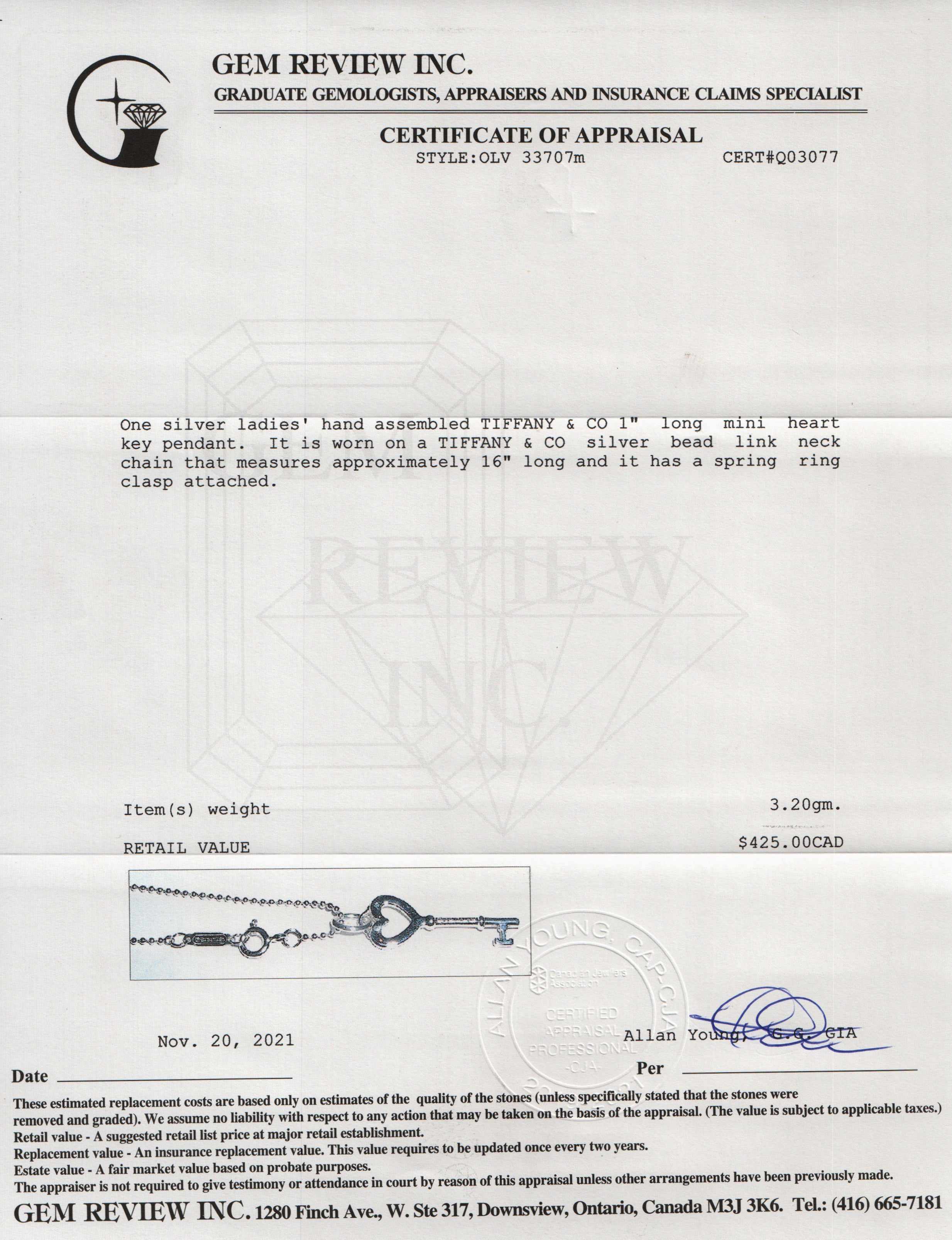 Tiffany & Co. Mini Heart Key Pendant Necklace