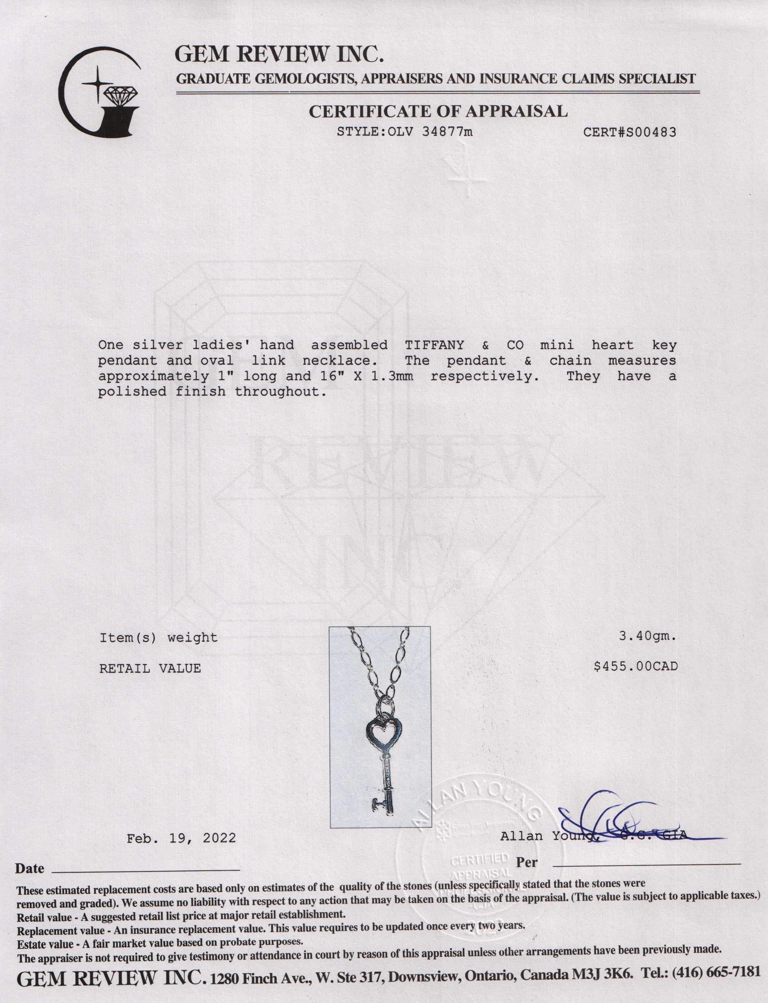 Tiffany & Co. Mini Heart Key Pendant Necklace