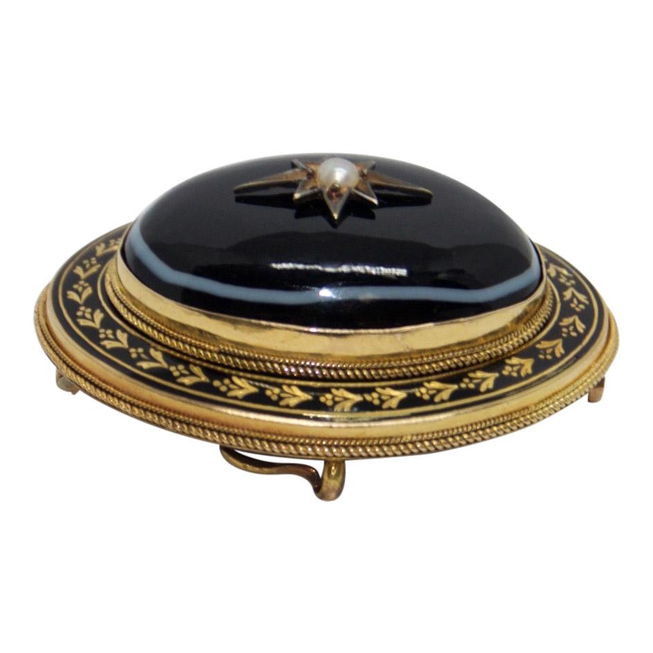 Antique Oval Brooch with Black Enamel and Cabochon Onyx