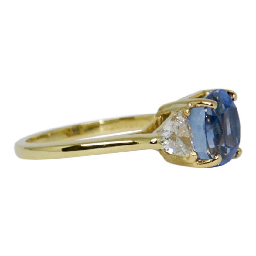 Blue Sapphire and Diamond Three Stone Ring
